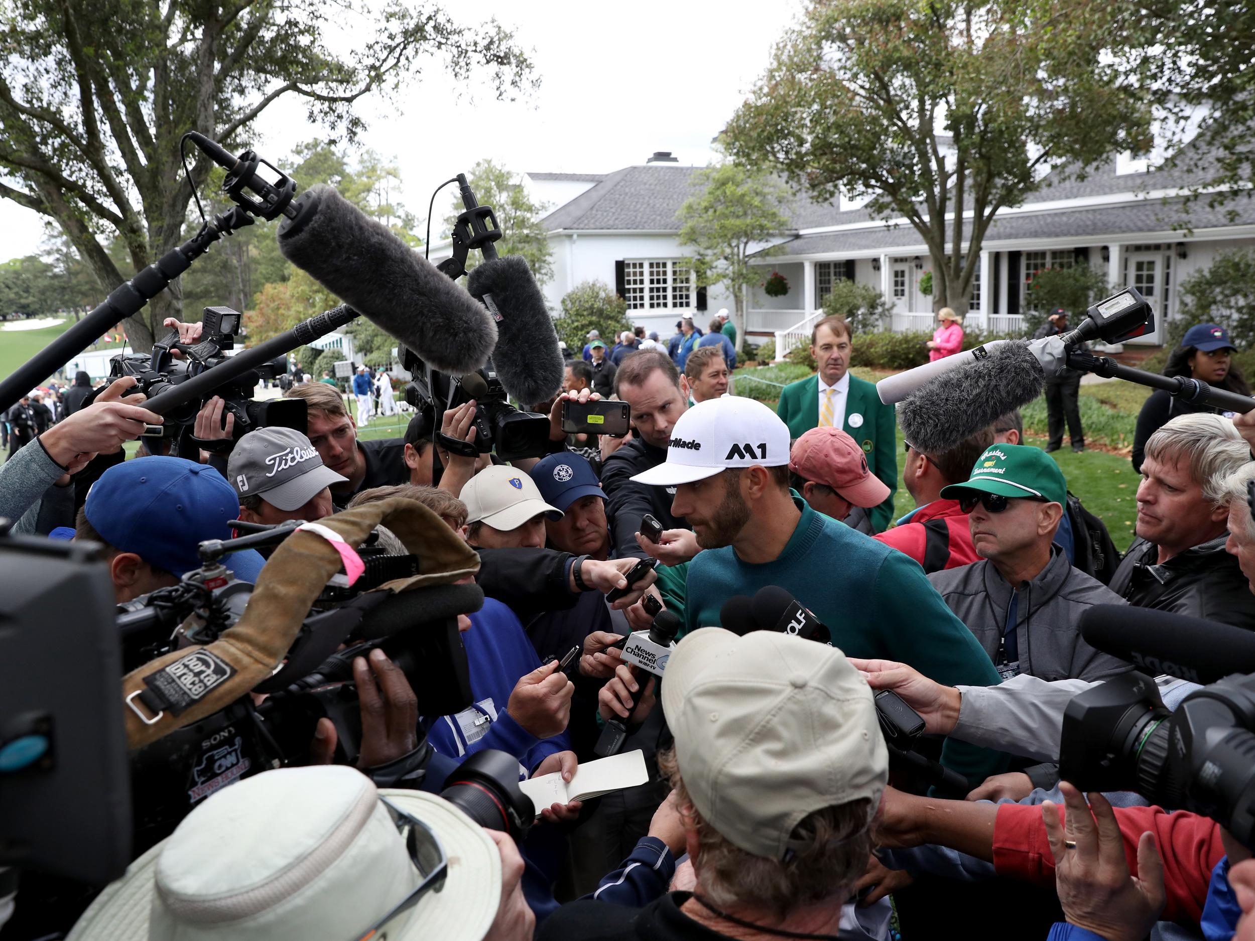 Johnson announcing his withdrawal to the media