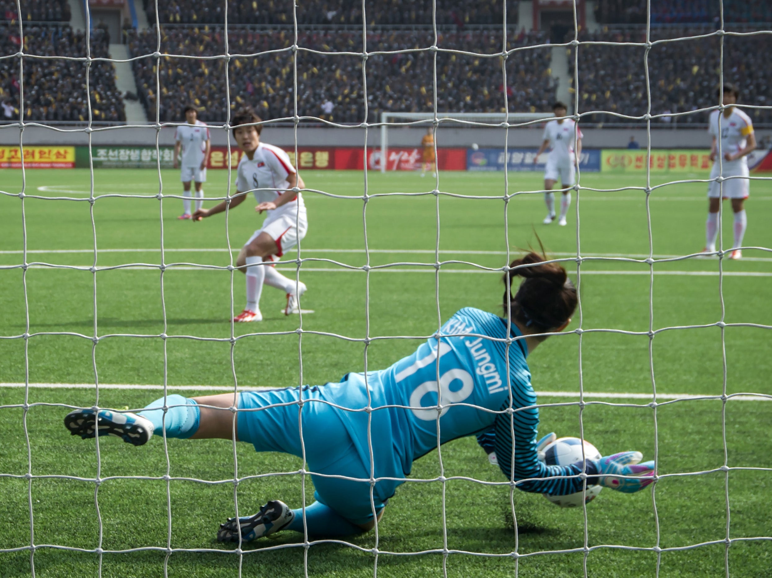 Wi Jong-Sim takes a penalty for the North (AFP/Getty )