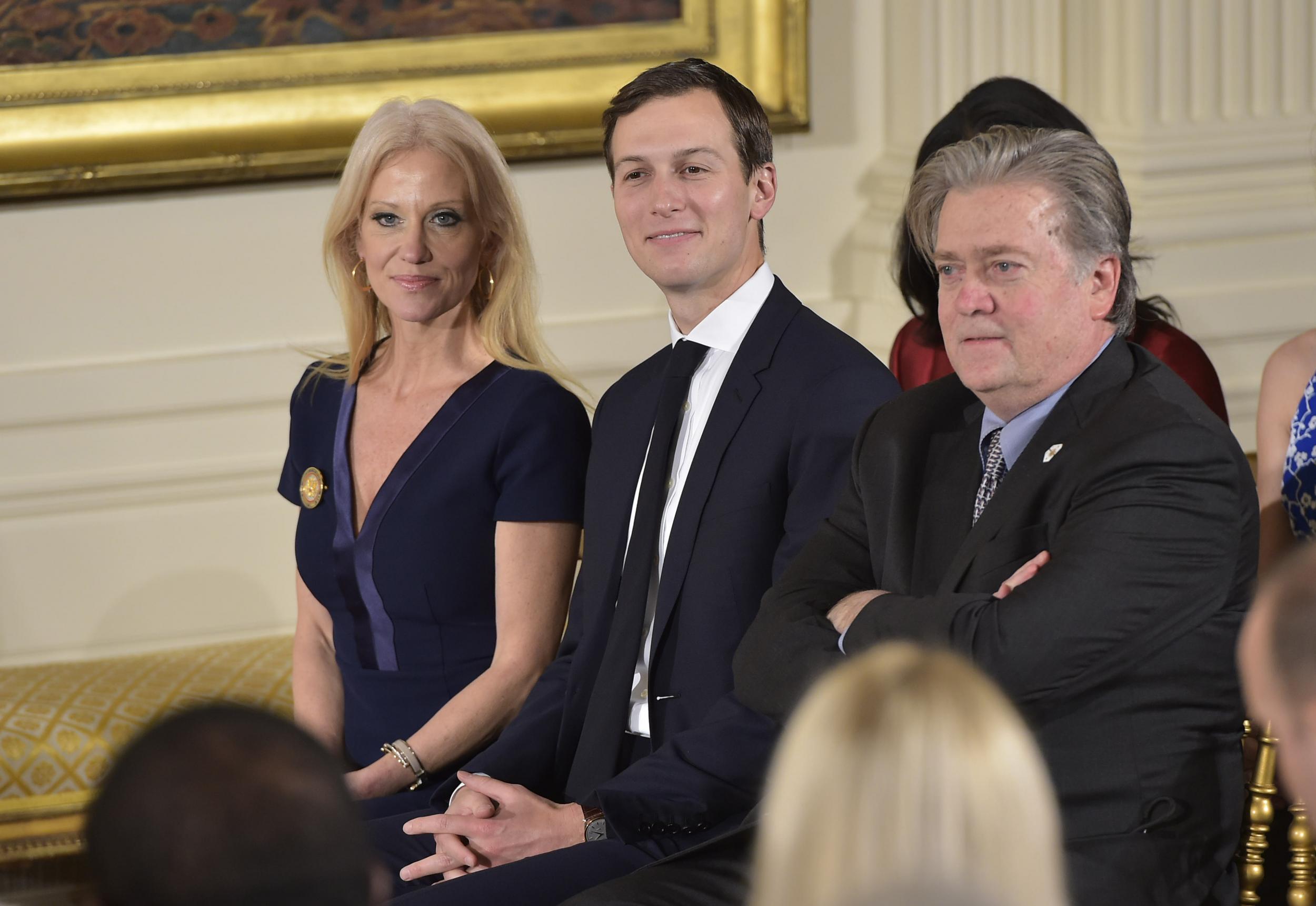 (L-R) Counselor to the President Kellyanne Conway, Senior Advisor Jared Kushner and Chief Strategist Steve Bannon