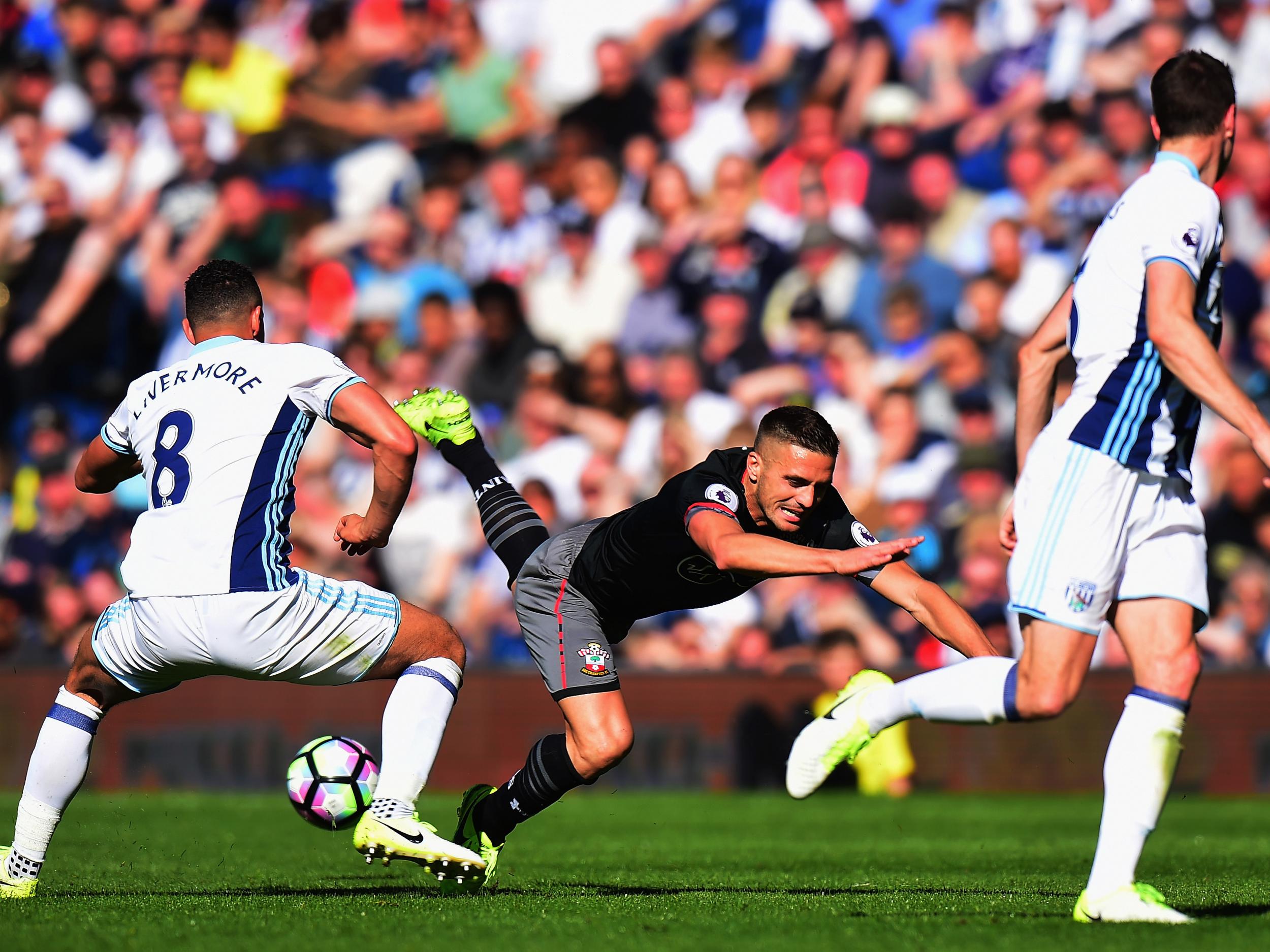 Southampton's Dusan Tadic takes a tumble