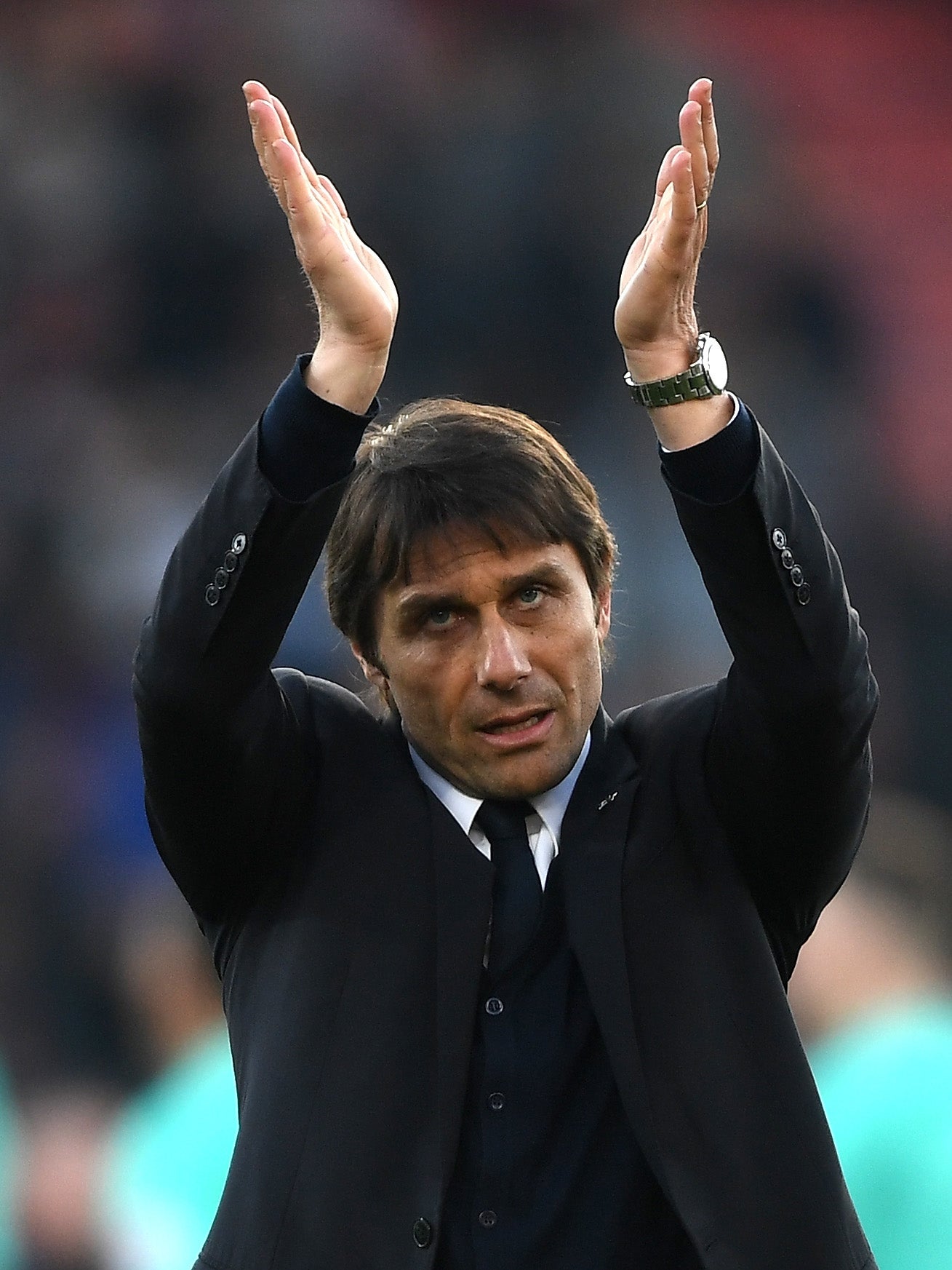 Conte shows appreciation to the travelling fans