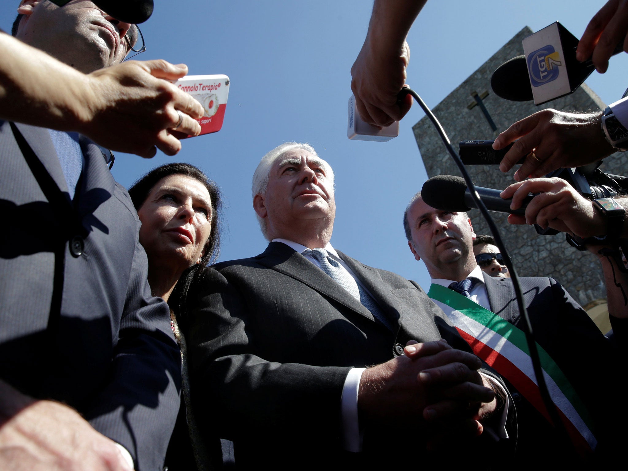 Rex Tillerson talks to reporters during a ceremony dedicated to the victims of the massacre committed in the village of Sant'Anna di Stazzema by the Nazis in 1944