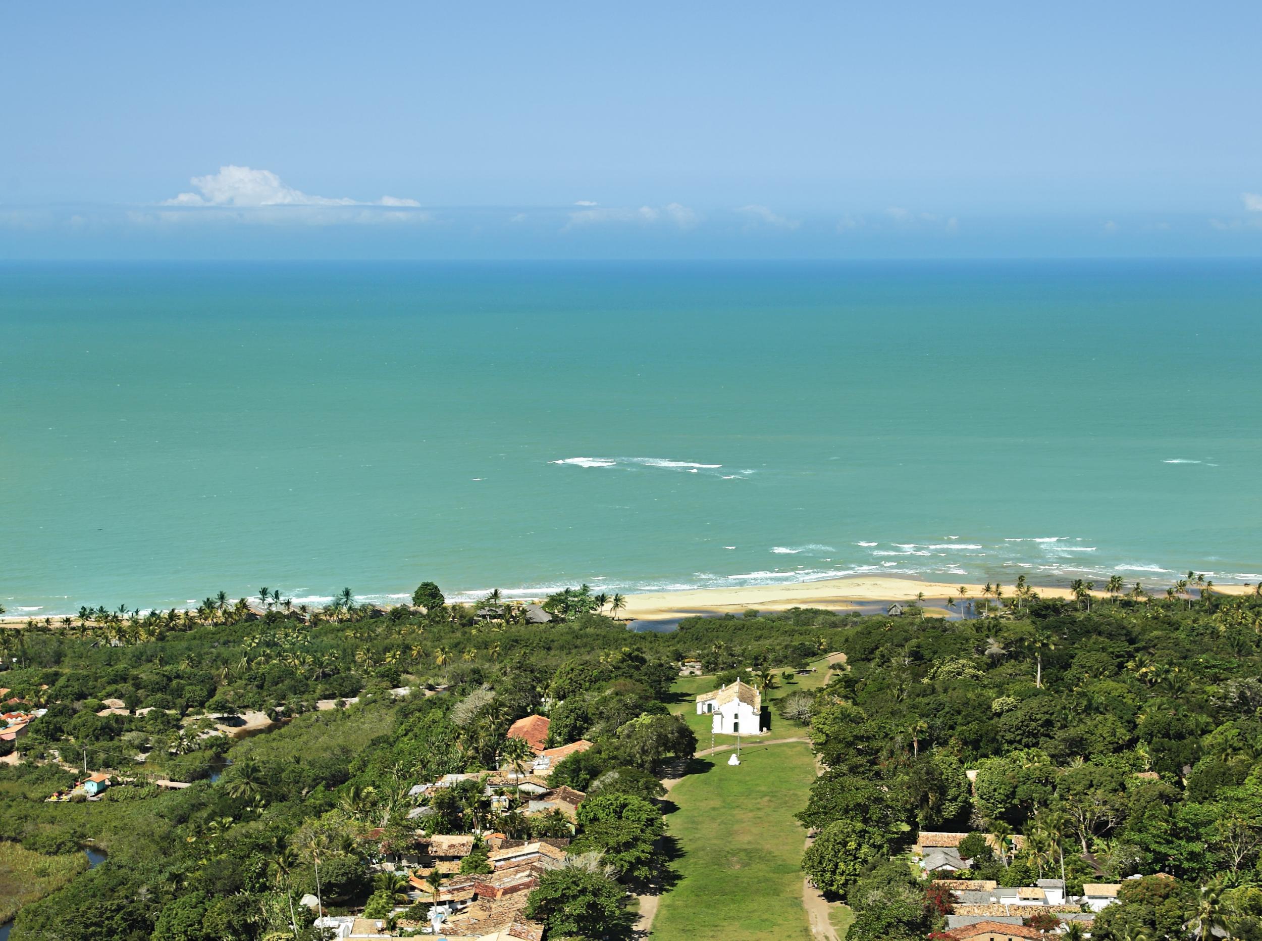 The white church dominates the village landscape (Uxua Casa Hotel)