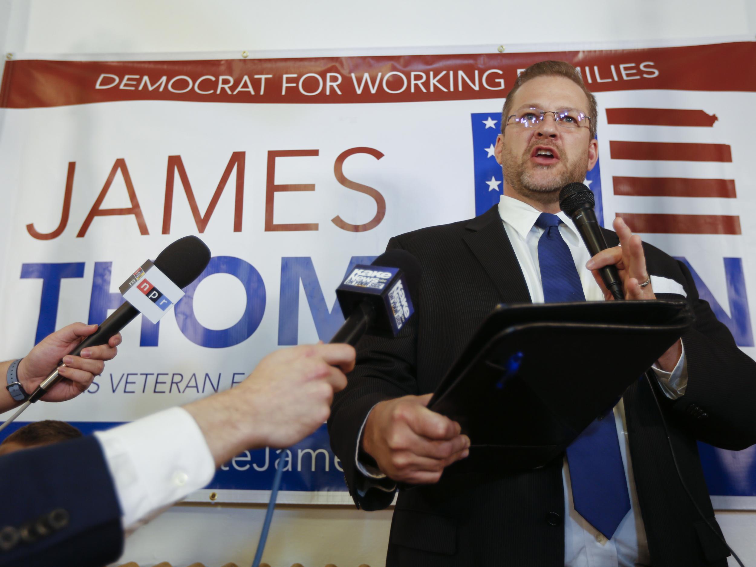 Democratic candidate James Thompson concedes defeat after an unexpectedly close contest with Republican Ron Estes