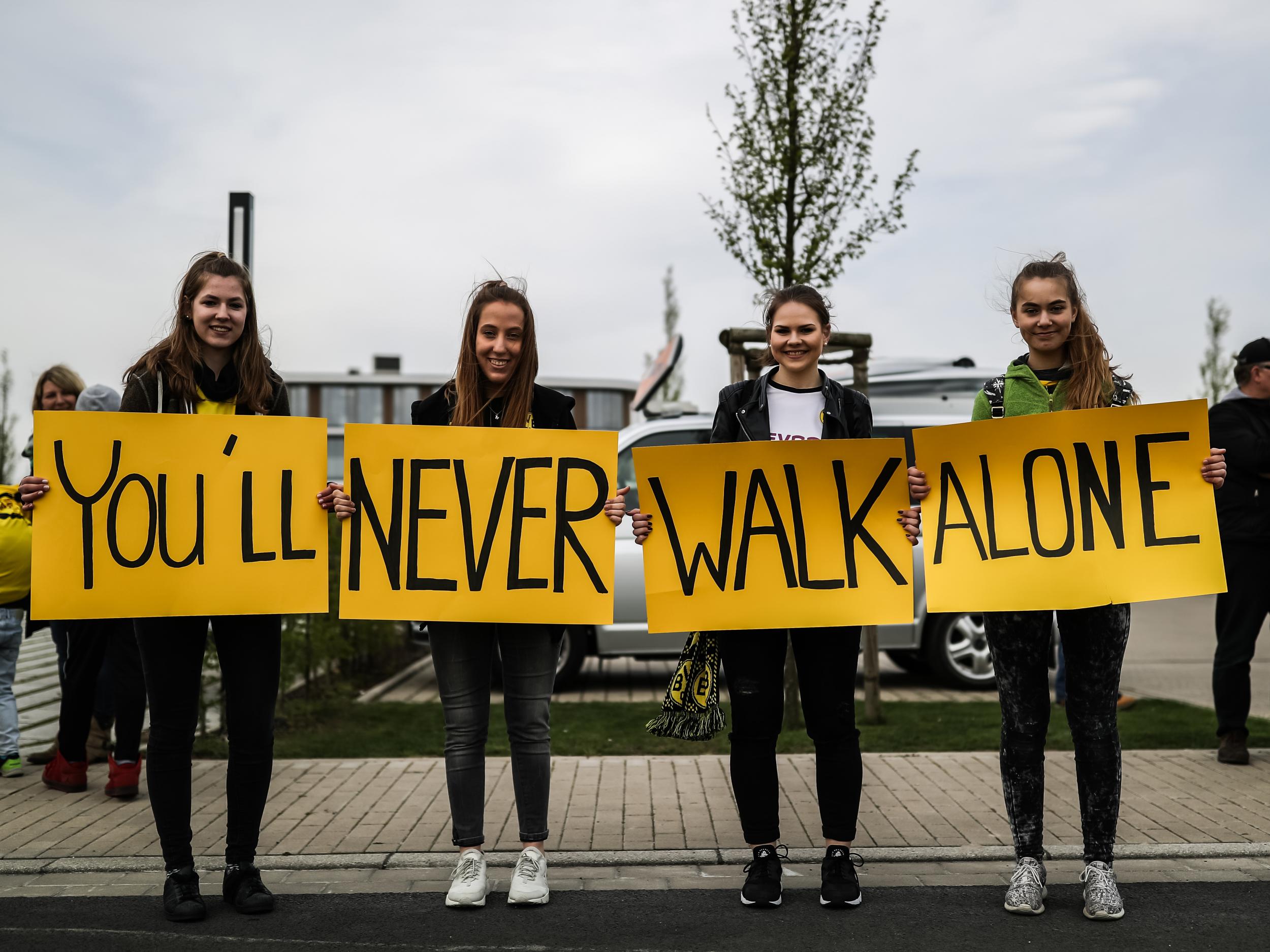 Dortmund supporters ahead of their club's rescheduled match against Monaco (Getty )