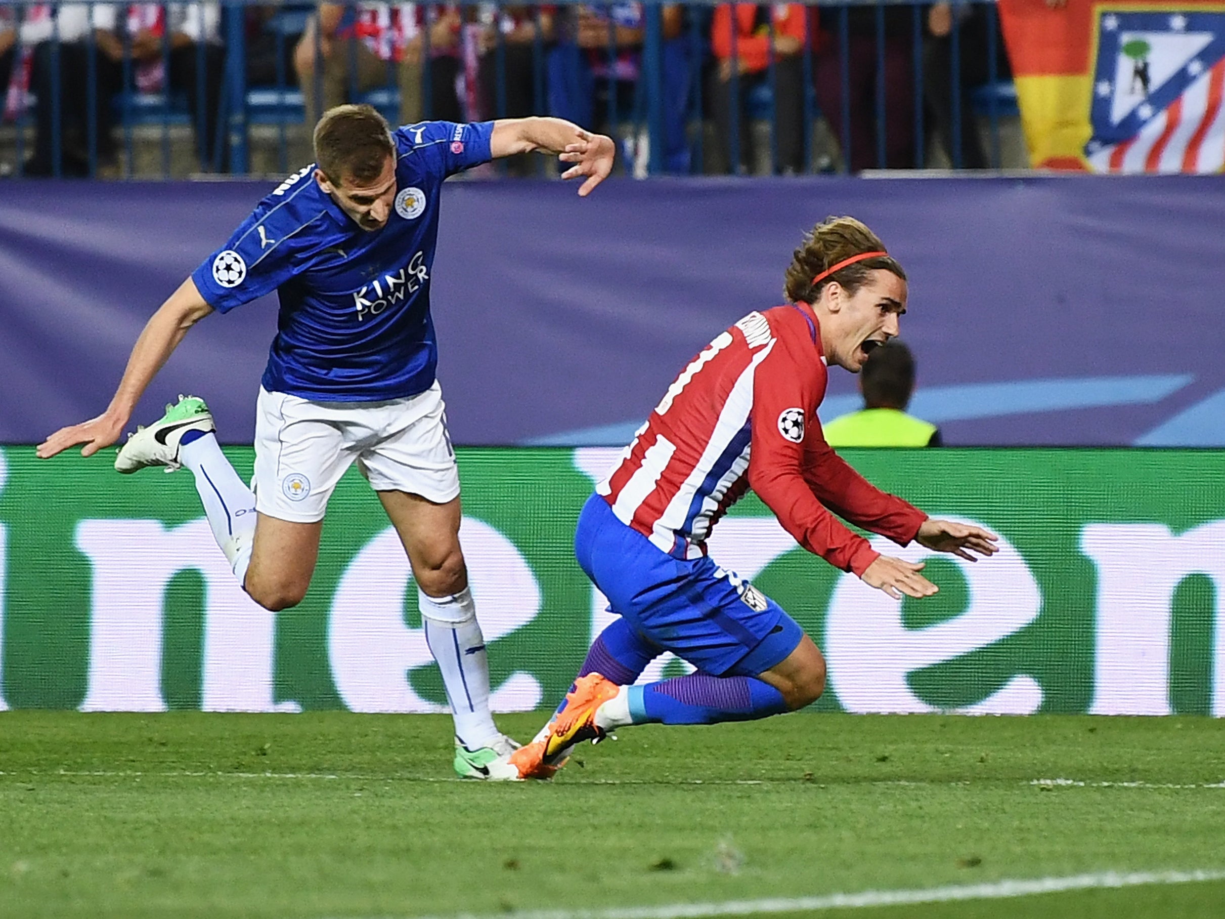 Marc Albrighton conceded a penalty when he tripped up Antoine Griezmann