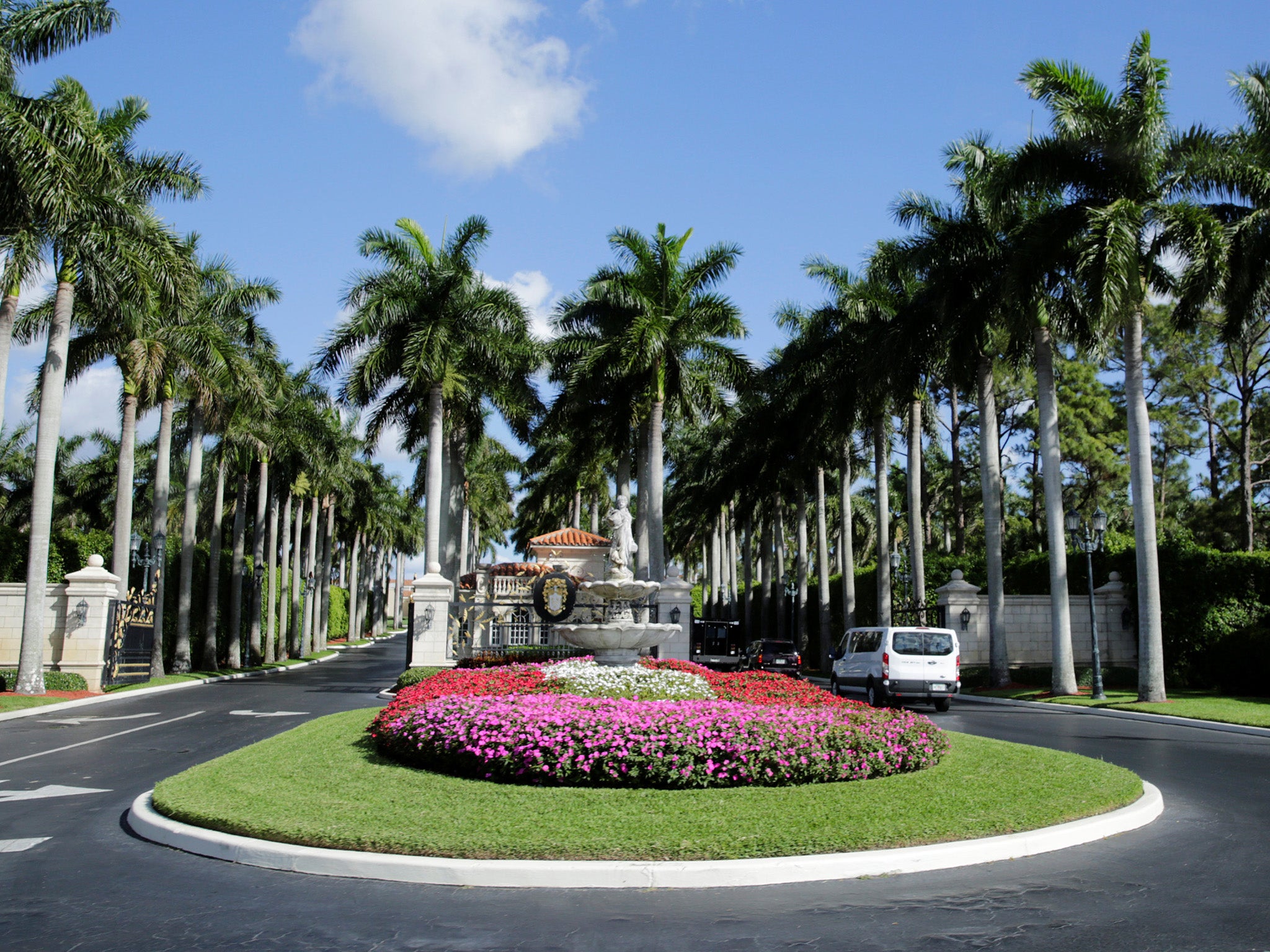 Donald Trump’s motorcade arrives at the Trump International Golf Club in West Palm Beach on Friday