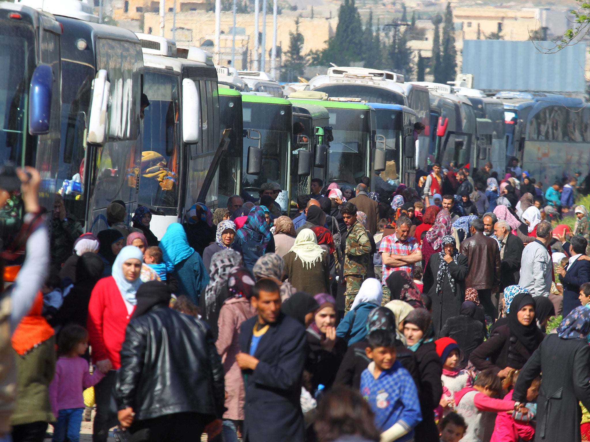 People evacuated from the two villages of Kefraya and Foua were left stranded in al-Rashideen, Aleppo province, on 15 April