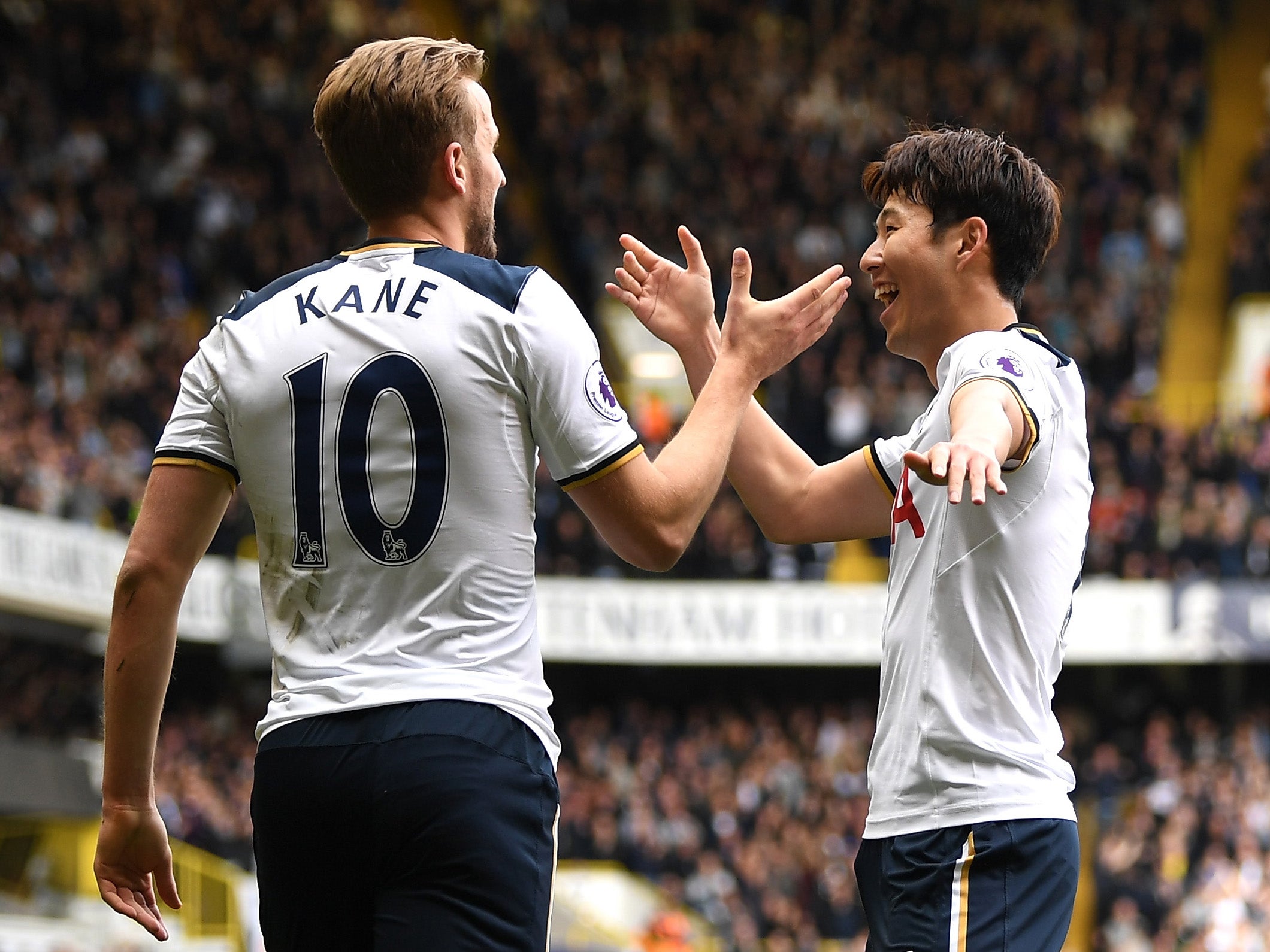 Kane and Son celebrate with their 'bespoke' handshake