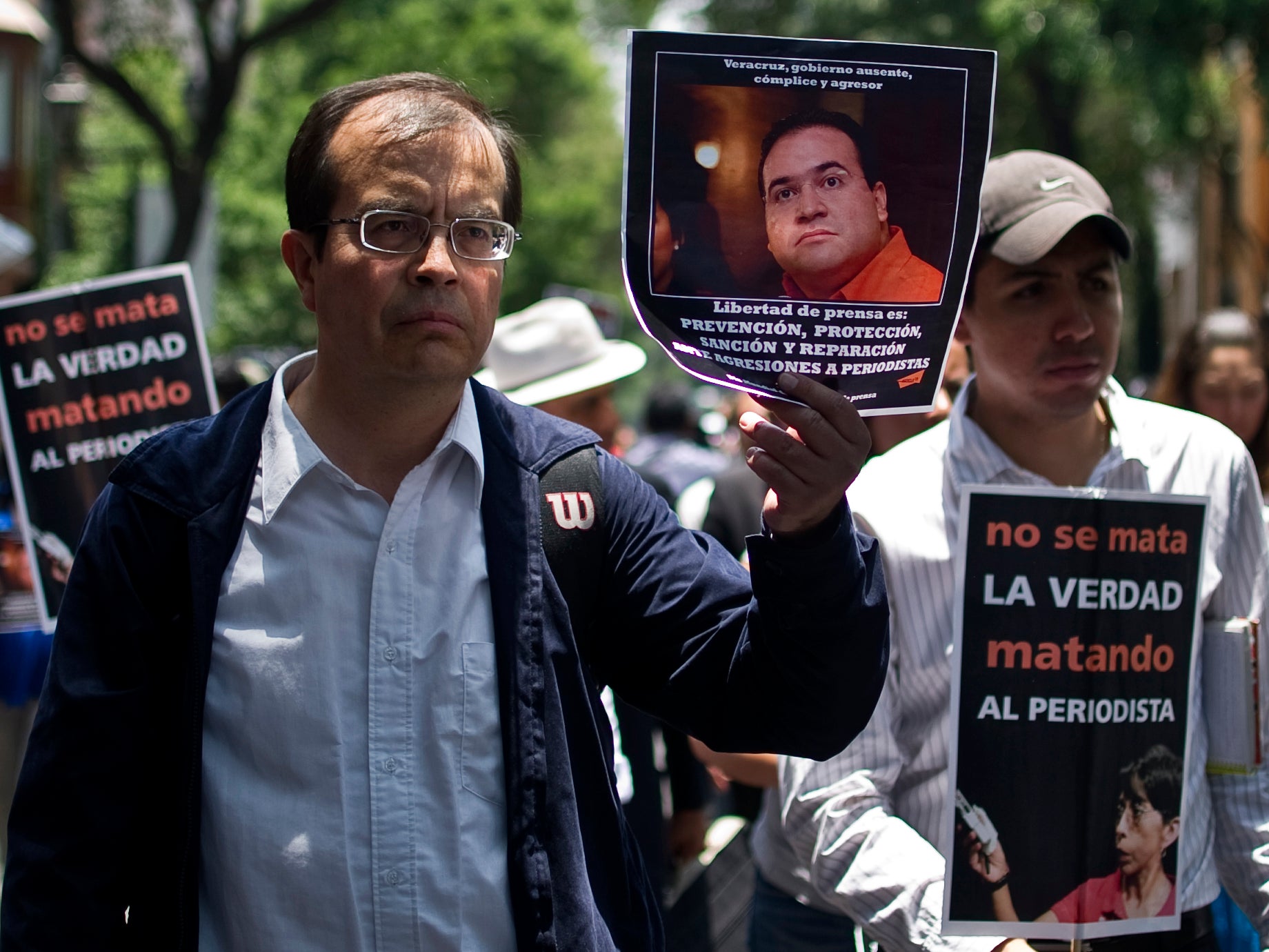 Mexican journalists protesting in Veracruz at the killing of their colleagues in 2012. At least 17 have died since Duarte came to power in 2010