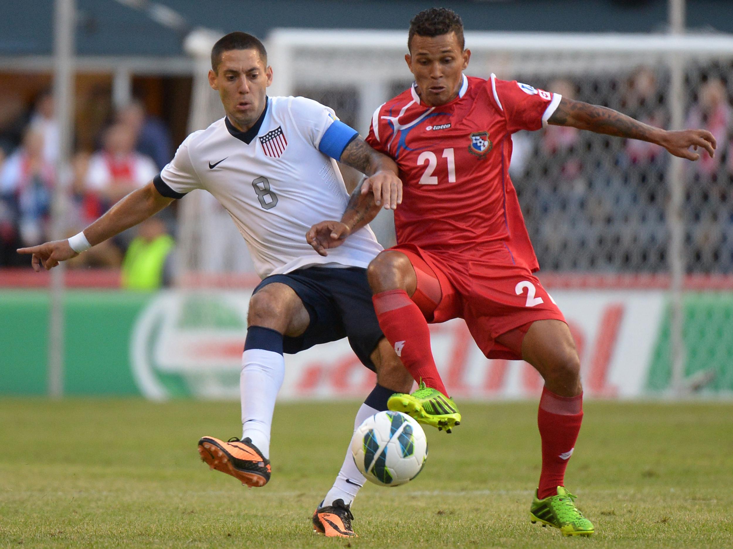 Amilcar Henriquez playing against Clint Dempsey in a 2013 match