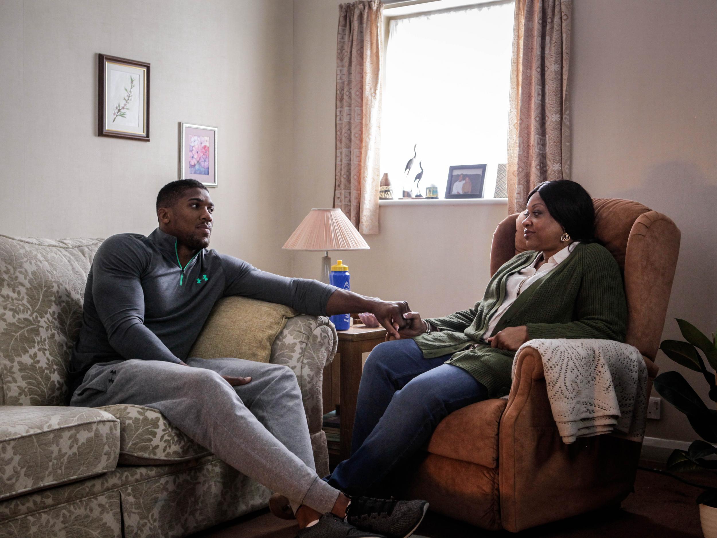 The heavyweight boxer at home with his mother, Yeta
