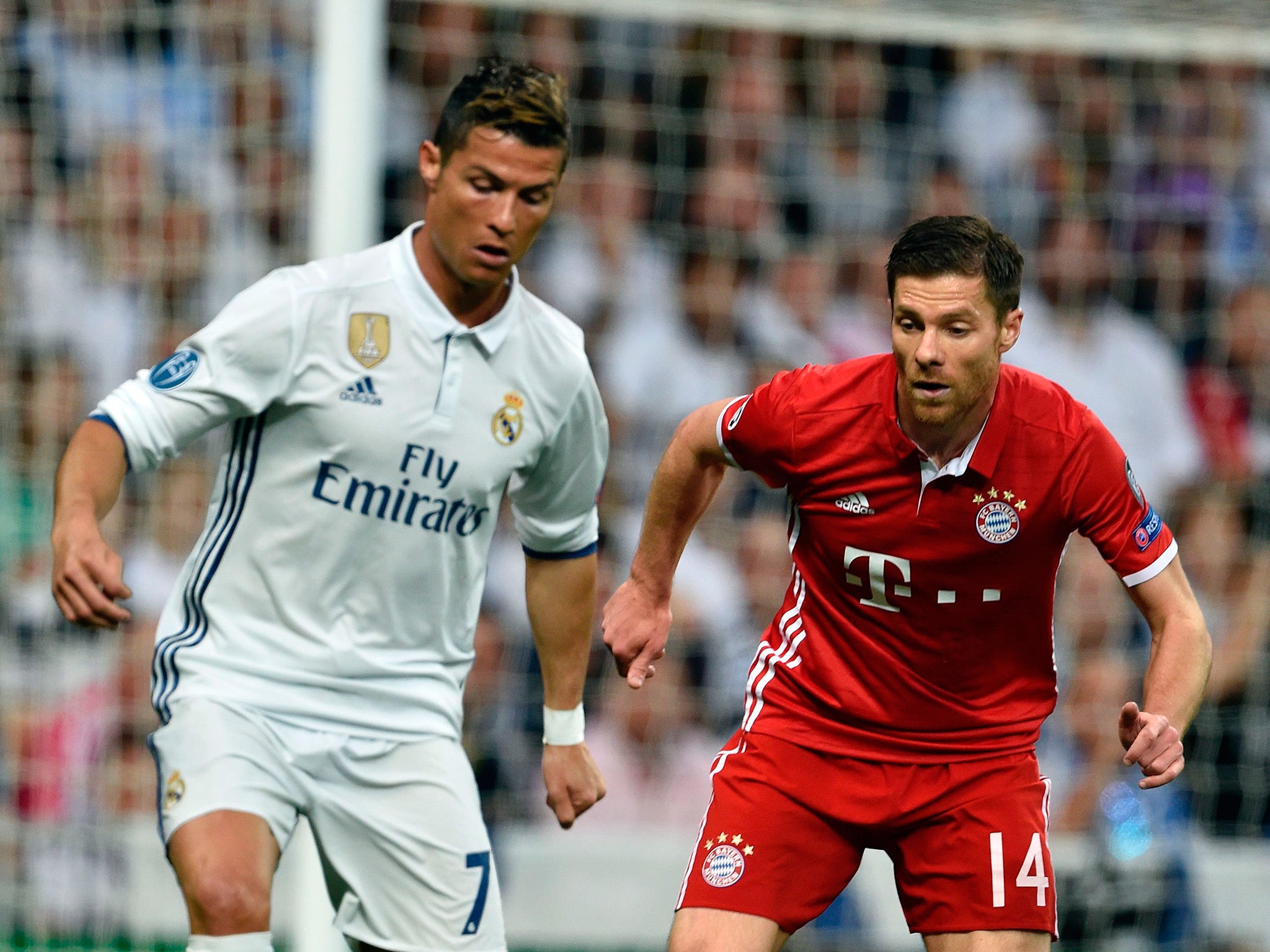 Cristiano Ronaldo comes up against former team-mate Xabi Alonso