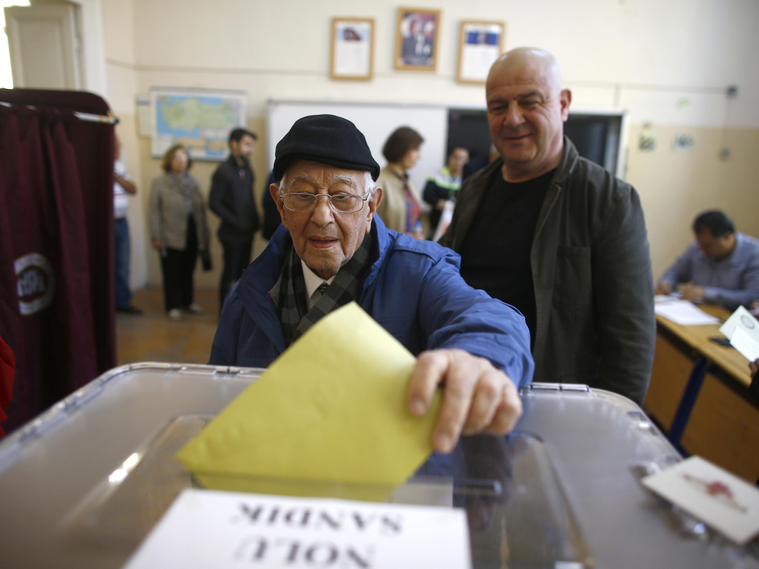 A man casts his ballot at a polling station in Izmir during the constitutional referendum