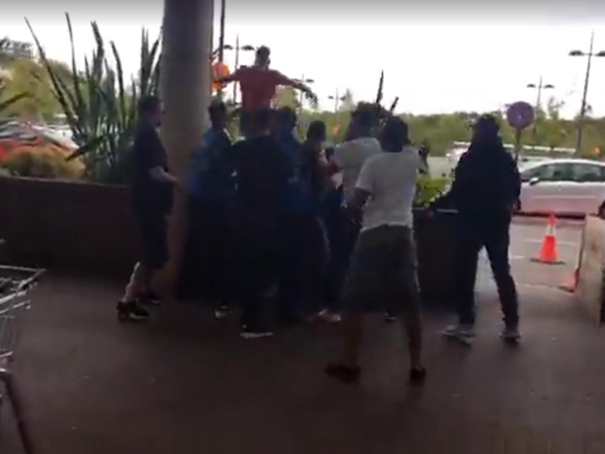 A brawl broke out at a shopping centre after vigilante group The Hunted One confronted a suspect