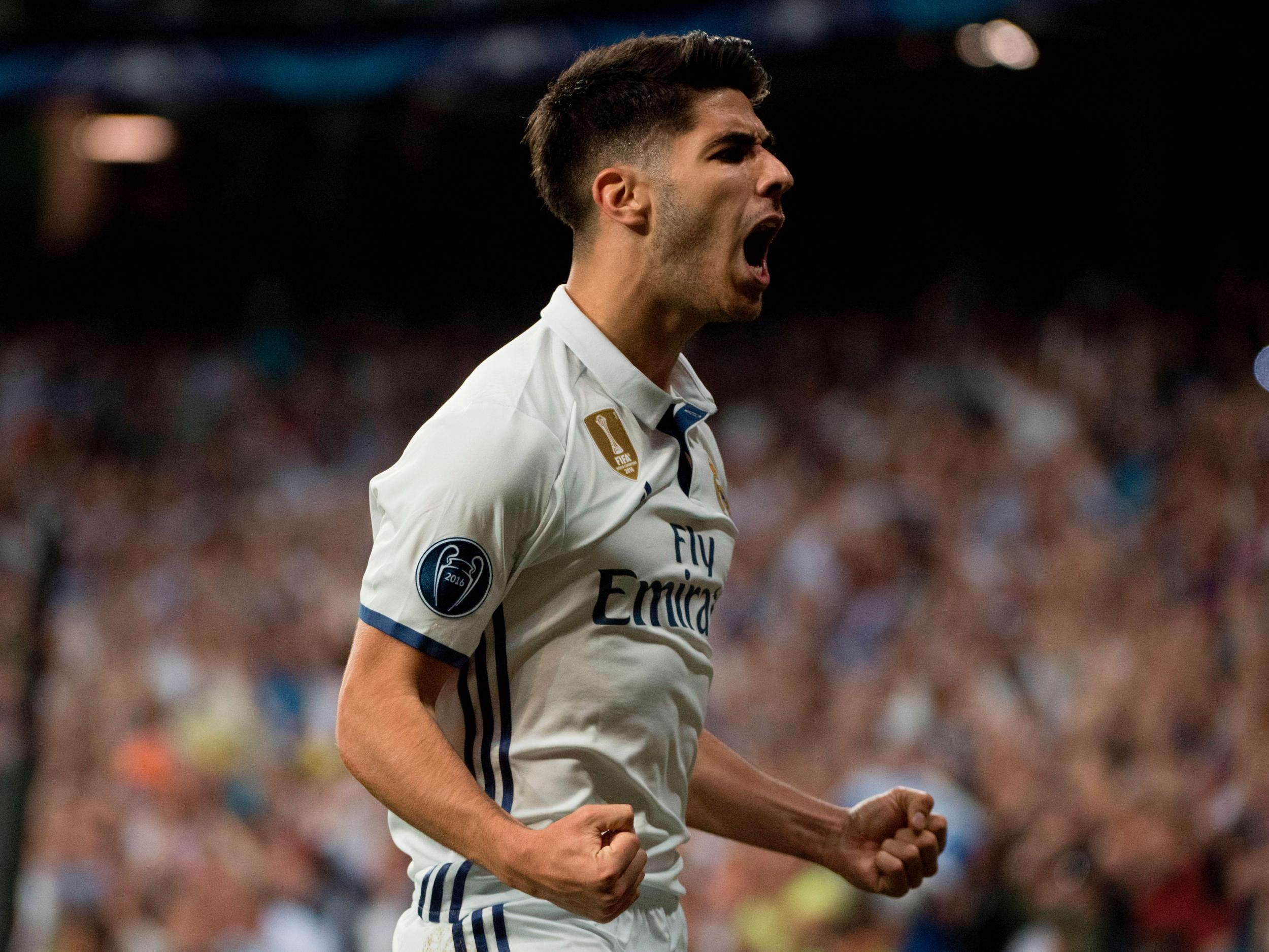 Marco Asensio celebrates his extra-time goal against Bayern