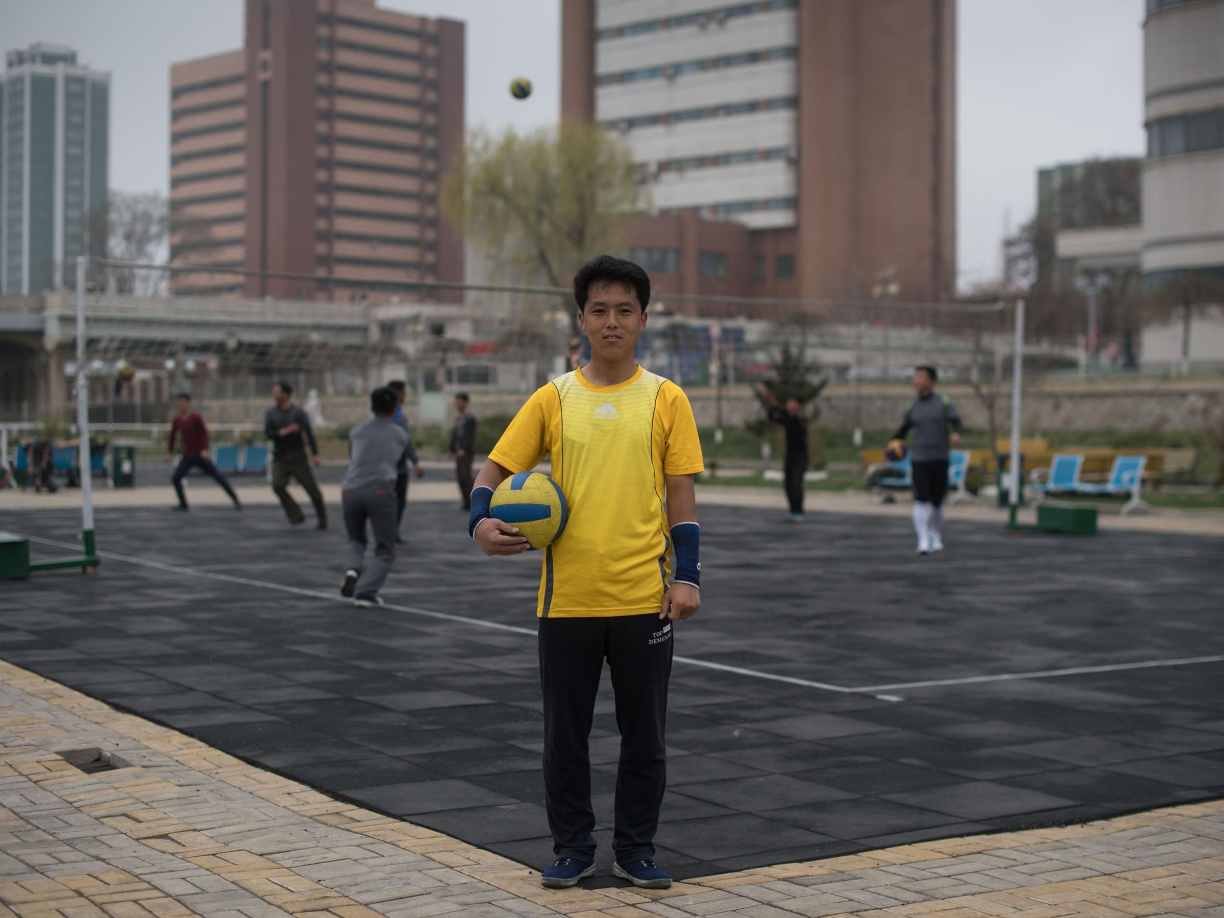 Amateur volleyball player Kim Hyok poses for a portrait during a practice session in Pyongyang. The sport is hugely popular in the rogue nuclear state