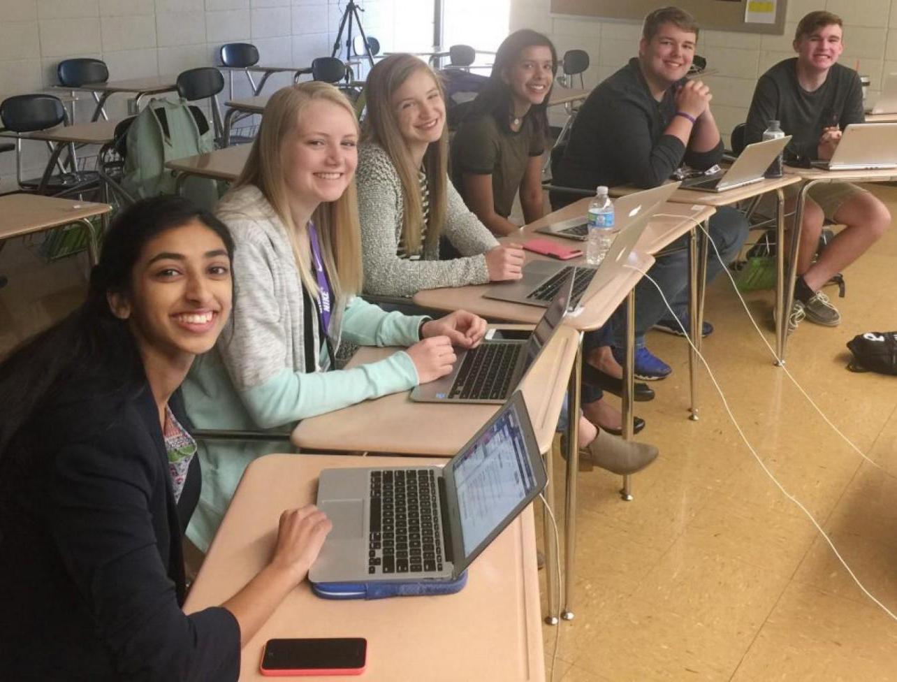 Gina Mathew, Kali Poenitske, Maddie Baden, Trina Paul, Connor Balthazor and Patrick Sullivan prepare to Skype with newly hired principal Amy Robertson