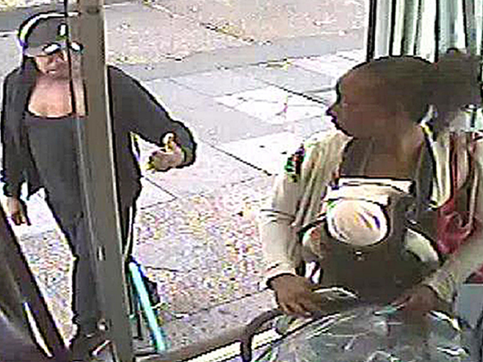 CCTV still issued by the Metropolitan Police of Rosalin Baker being given the thumbs up by Jeffrey Wiltshire as she boards a bus