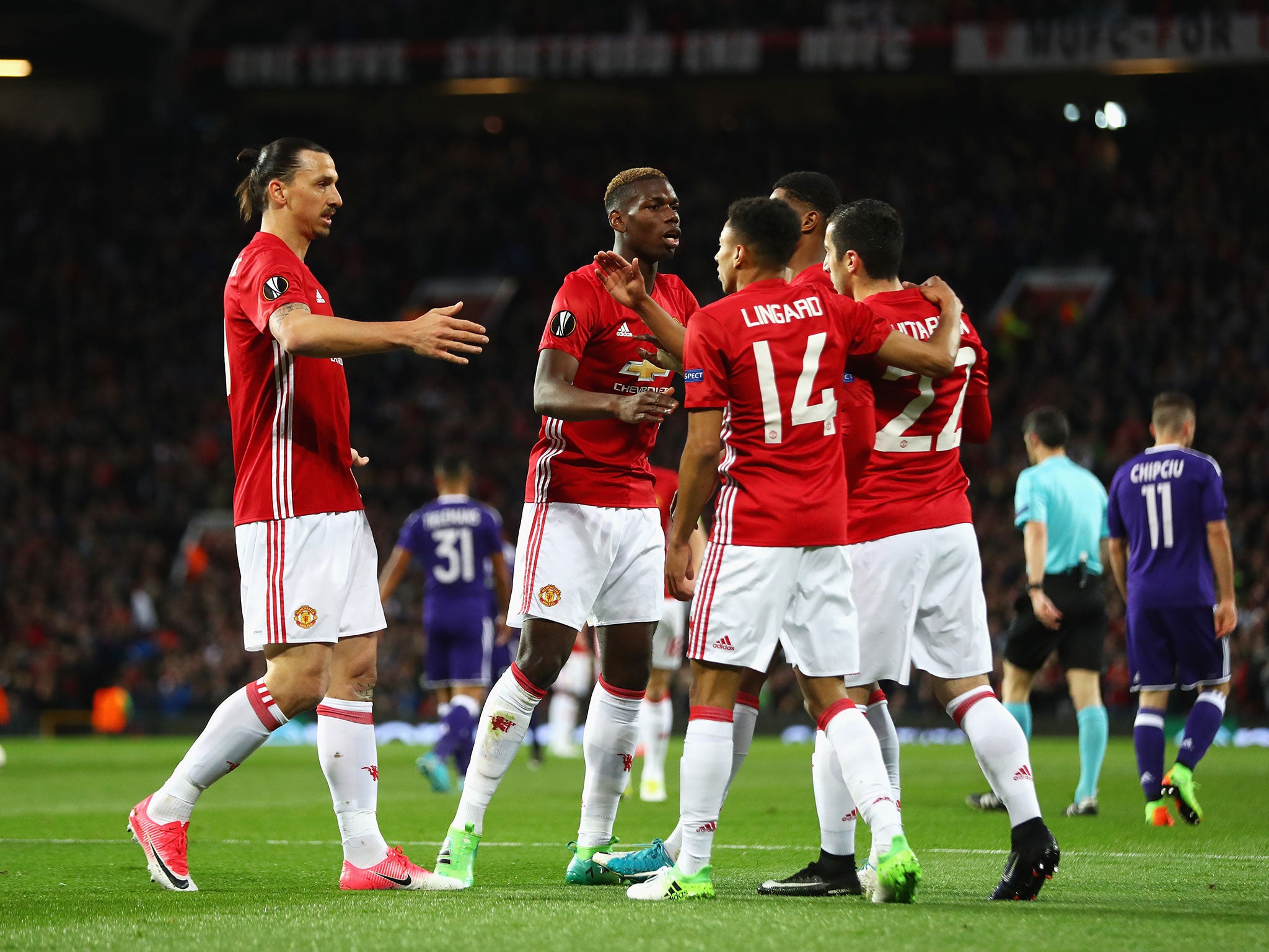 Henrikh Mkhitaryan celebrates his opener