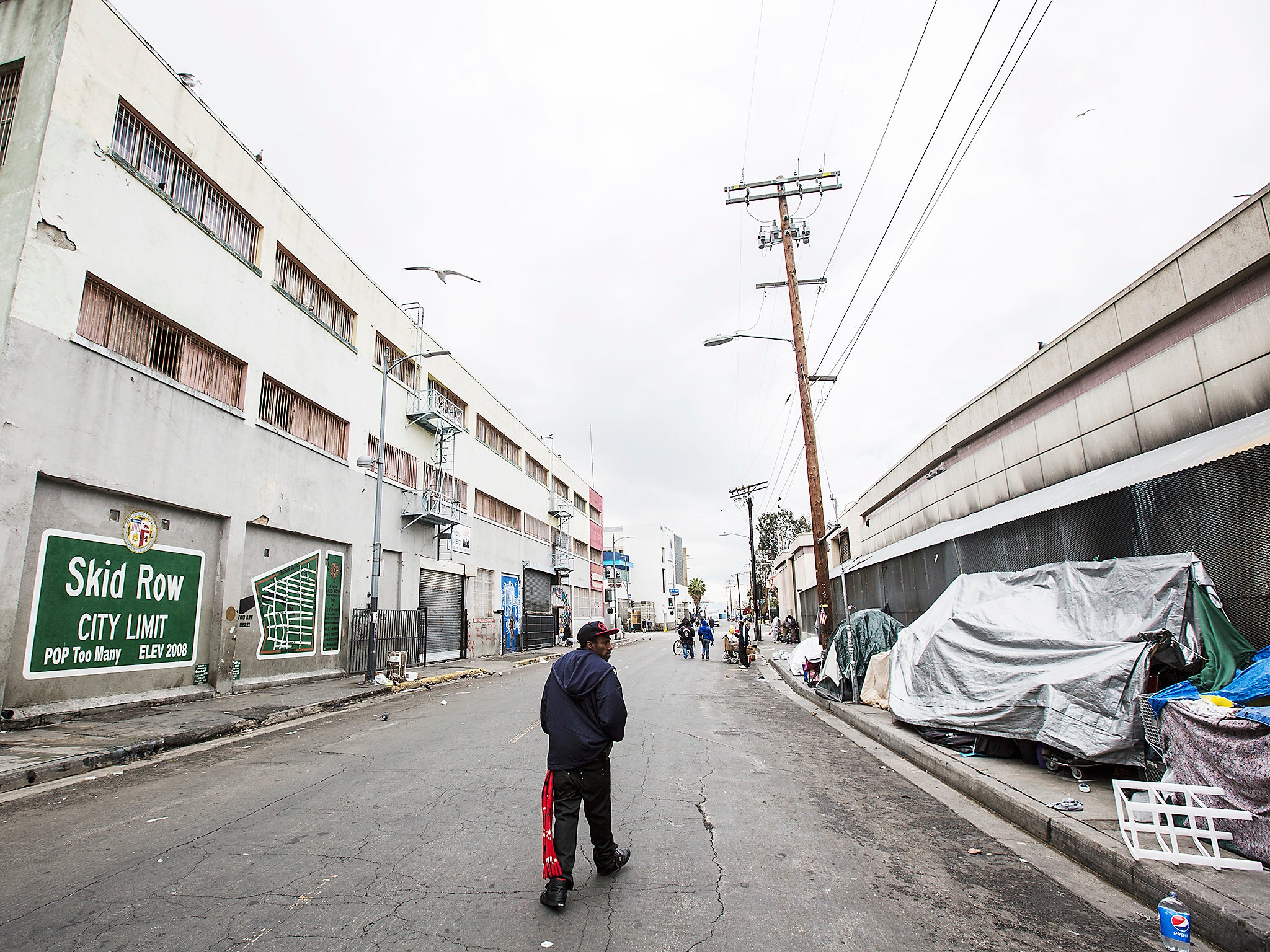 Skid Row in downtown Los Angeles. Skid Row has LA's largest concentration of homeless people who regularly camp on the sidewalks in tents and cardboard boxes