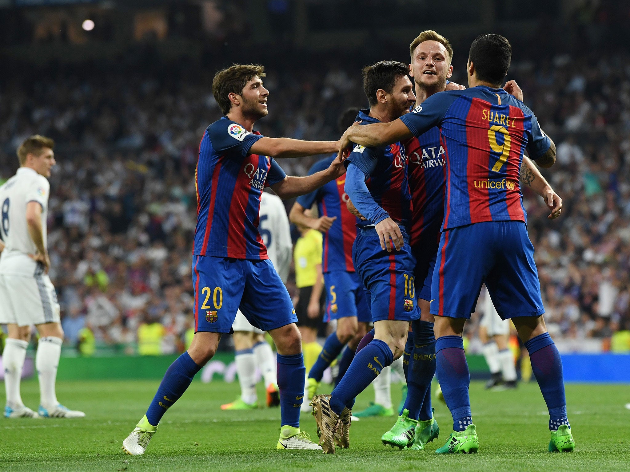 Barcelona celebrate after Messi's first goal levels the scores