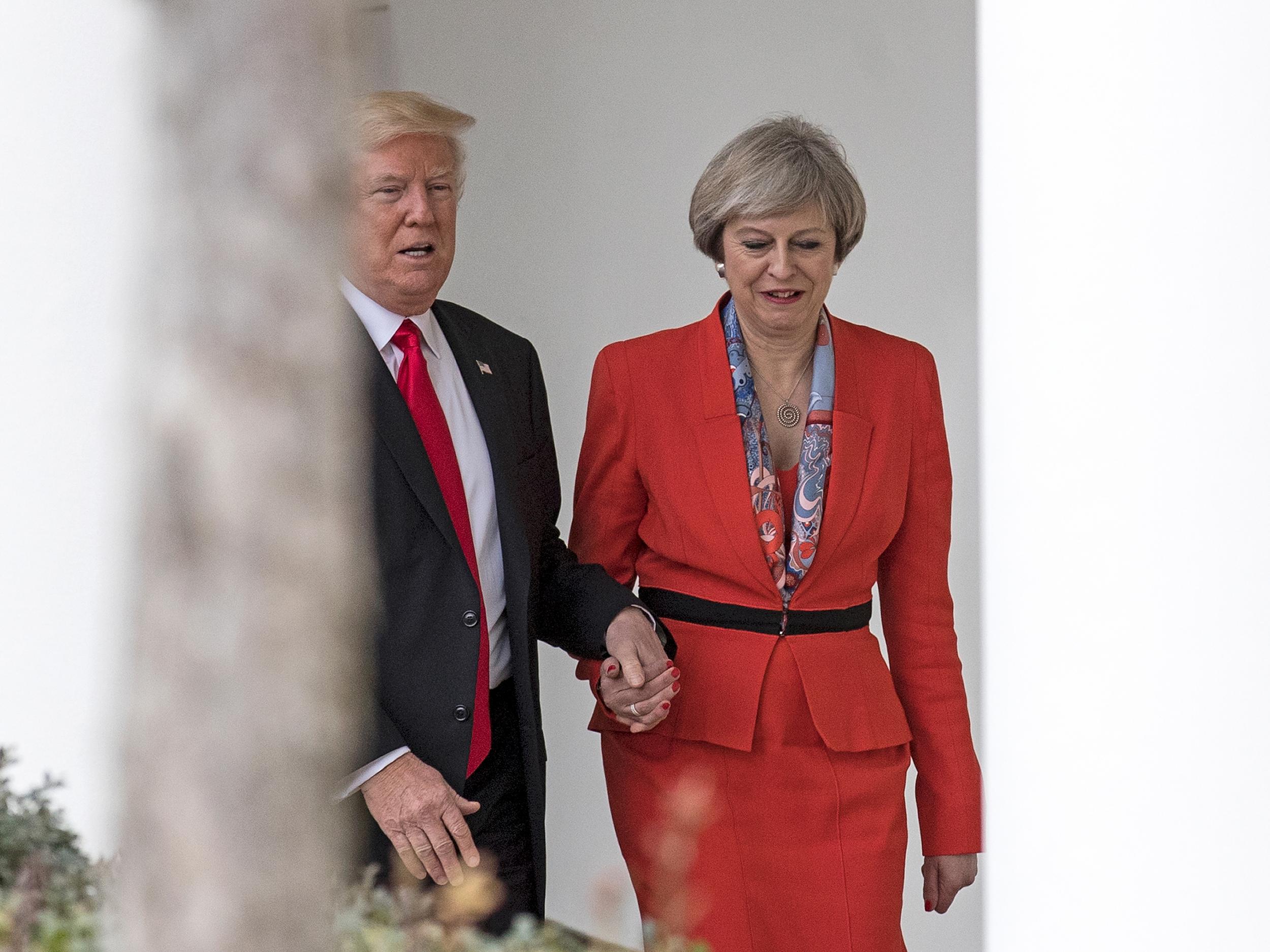 Theresa May was photographed holding hands with the US President at the White House in January