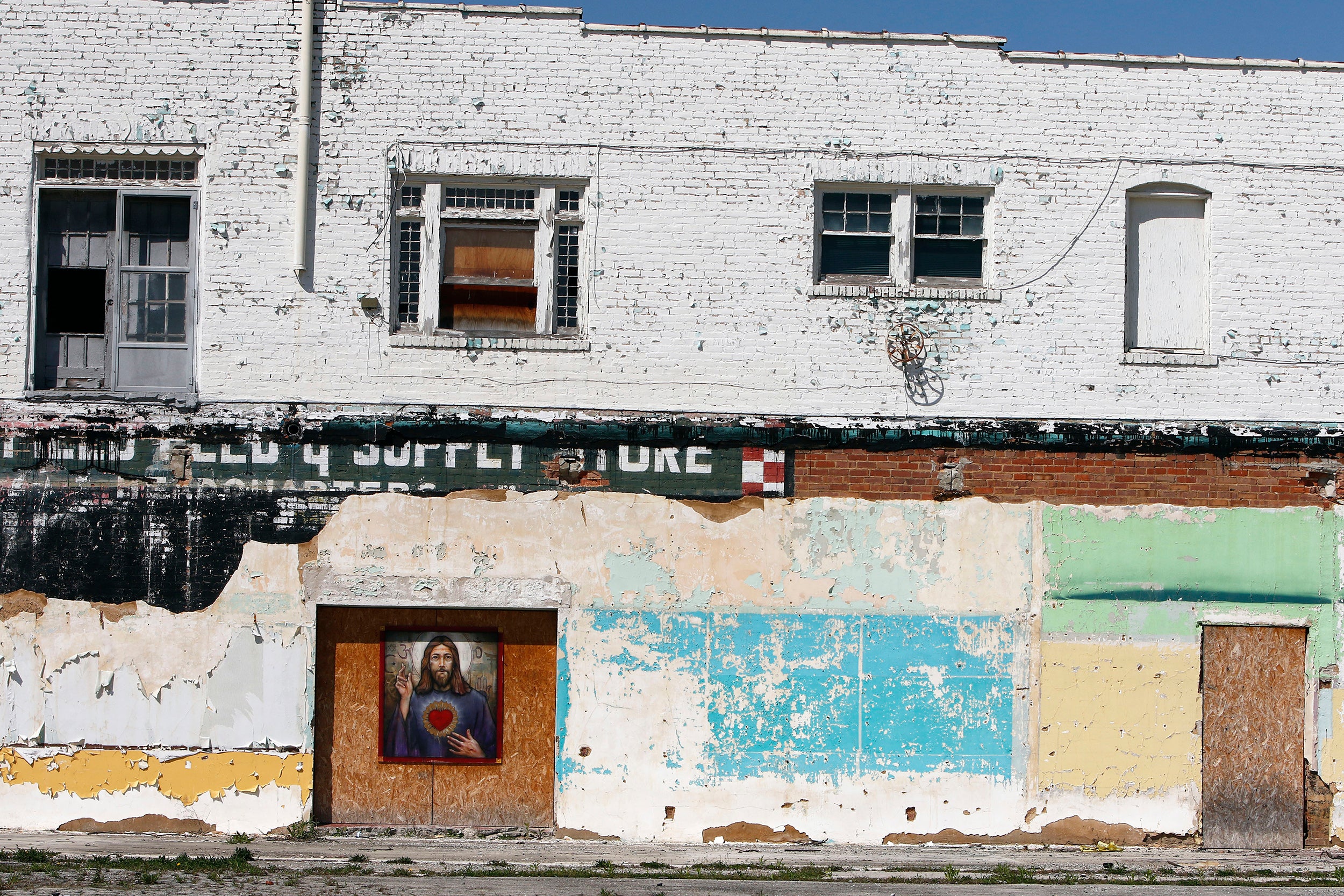 A portrait of Jesus Christ adorns the side of a building in Princeton