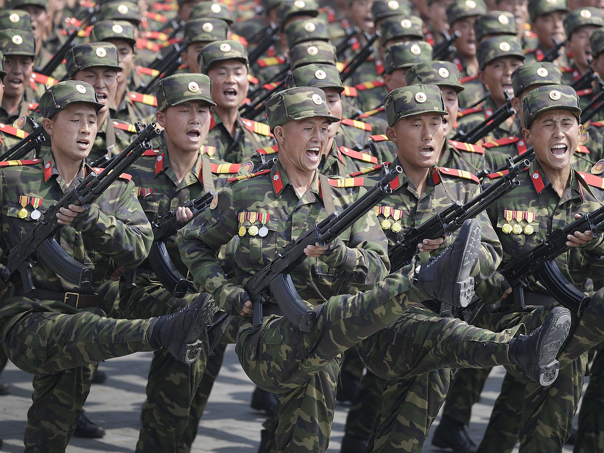 North Korean soldiers march across Kim Il-sung Square during a military parade in Pyongyang to celebrate the 105th birthday of Kim Il-sung, the country's late founder and grandfather of current ruler Kim Jong-un