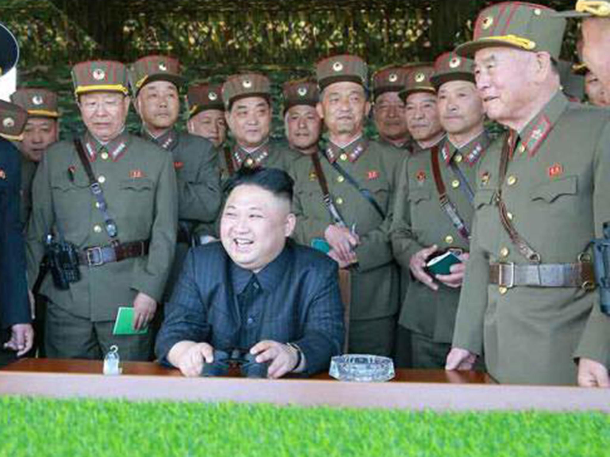 North Korean dictator Kim Jong-un oversees an artillery exercise