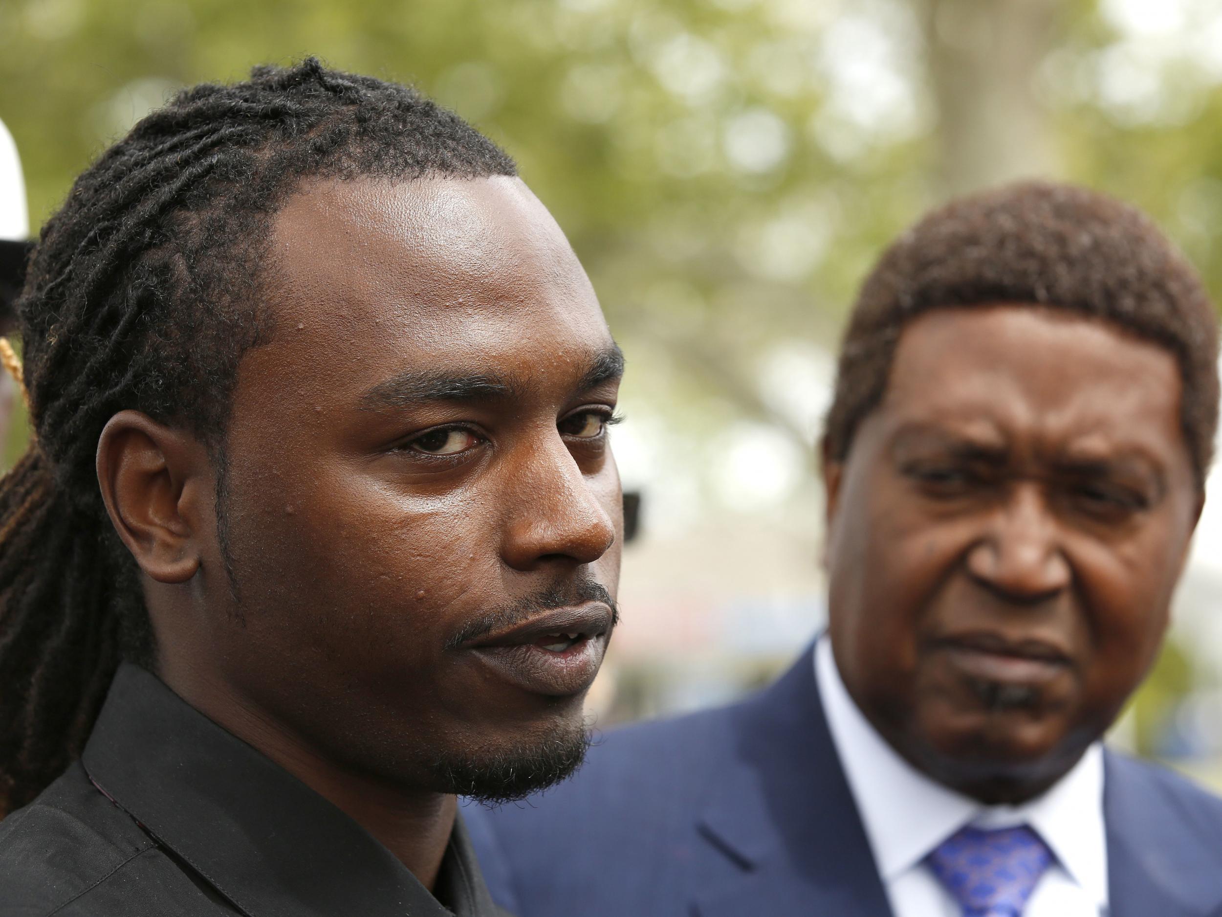 Nandi Cain, left, discusses the beating he received from a Sacramento Police officer