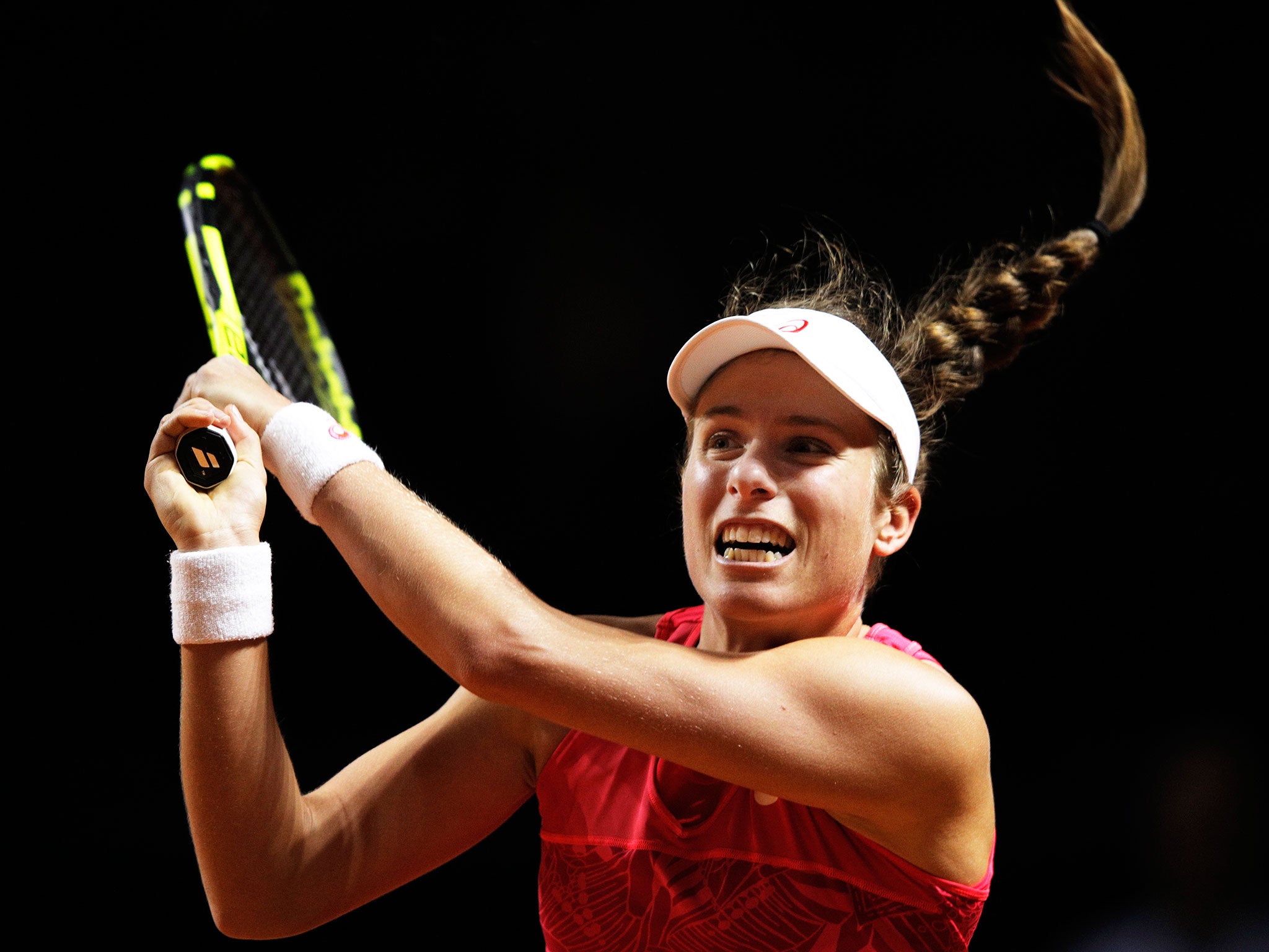 Konta in action against Naomi Osaka