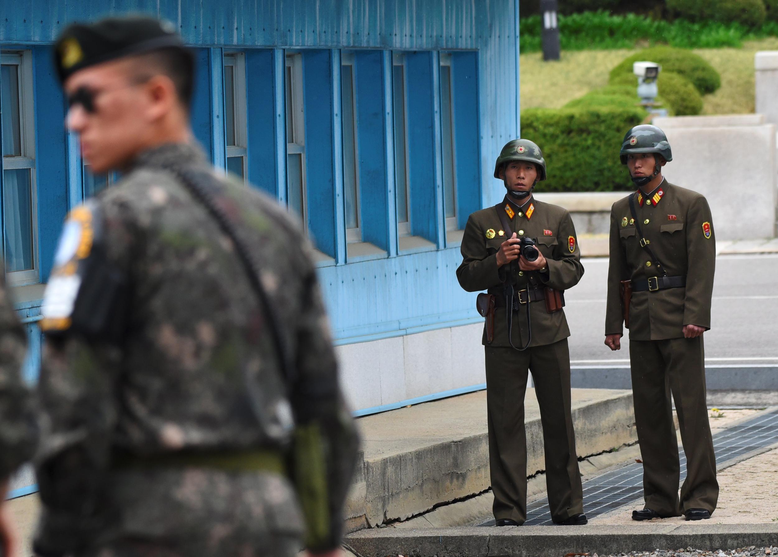 North Korean soldiers patrol the Demilitarised Zone, the border between North and South Korea