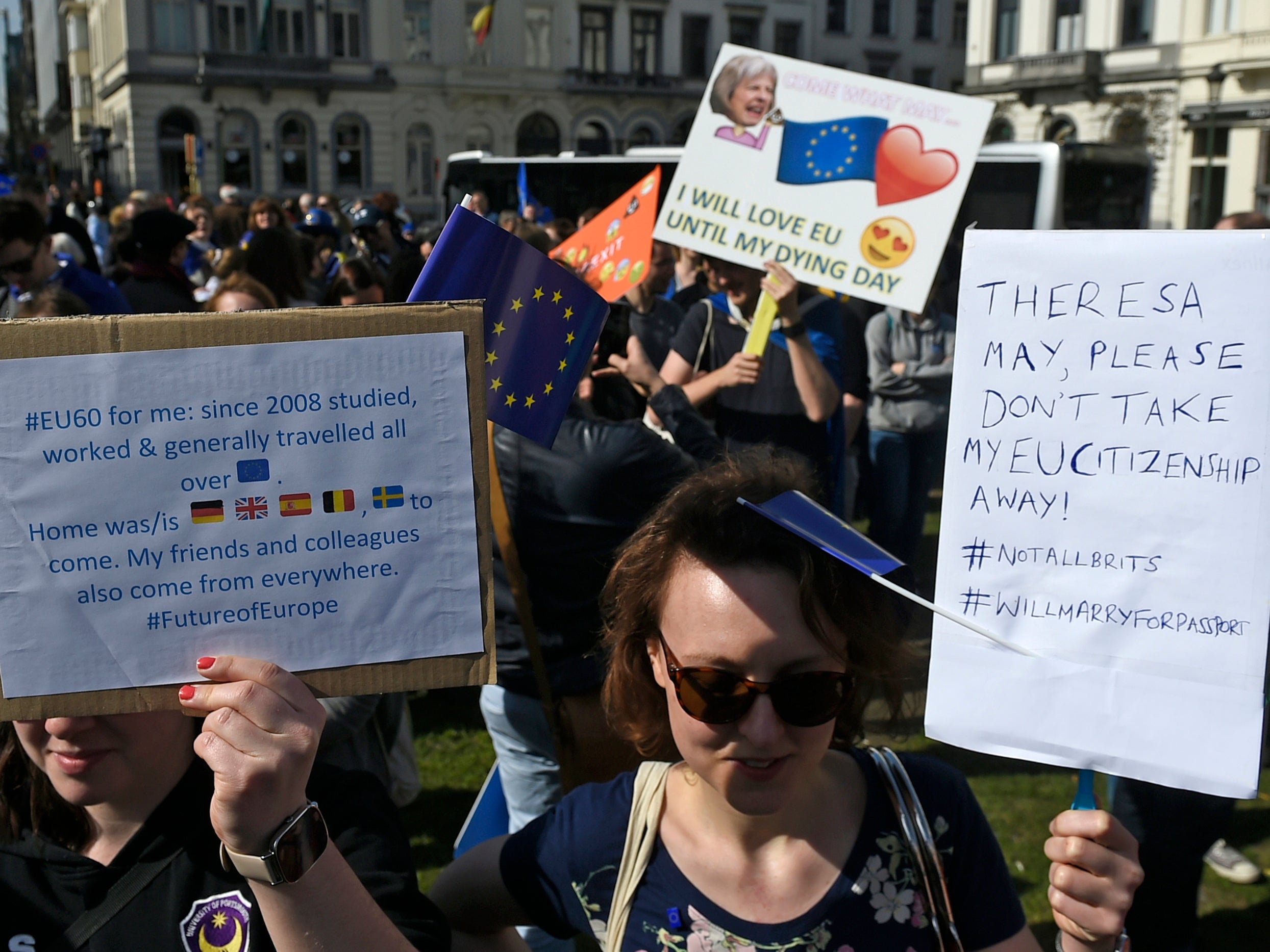 A lost cause? Pro-EU protester holds up placard against Brexit in Rome ahead of 60th anniversary celebrations