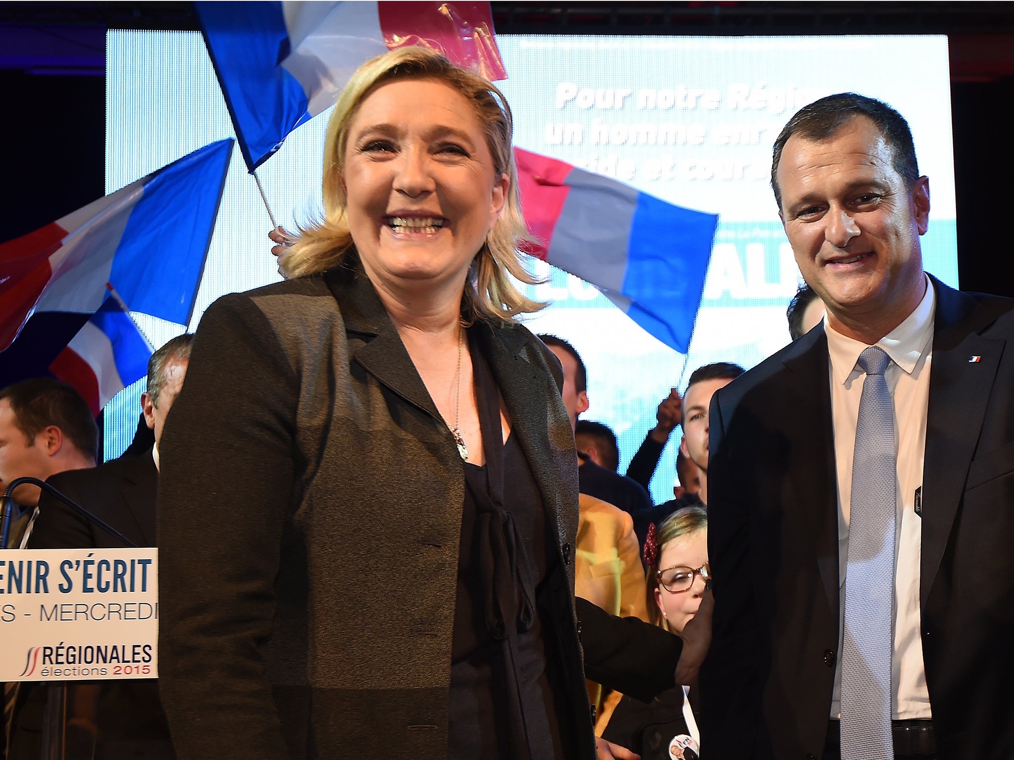 Marine Le Pen and her companion Louis Aliot during a meeting in Nimes, France