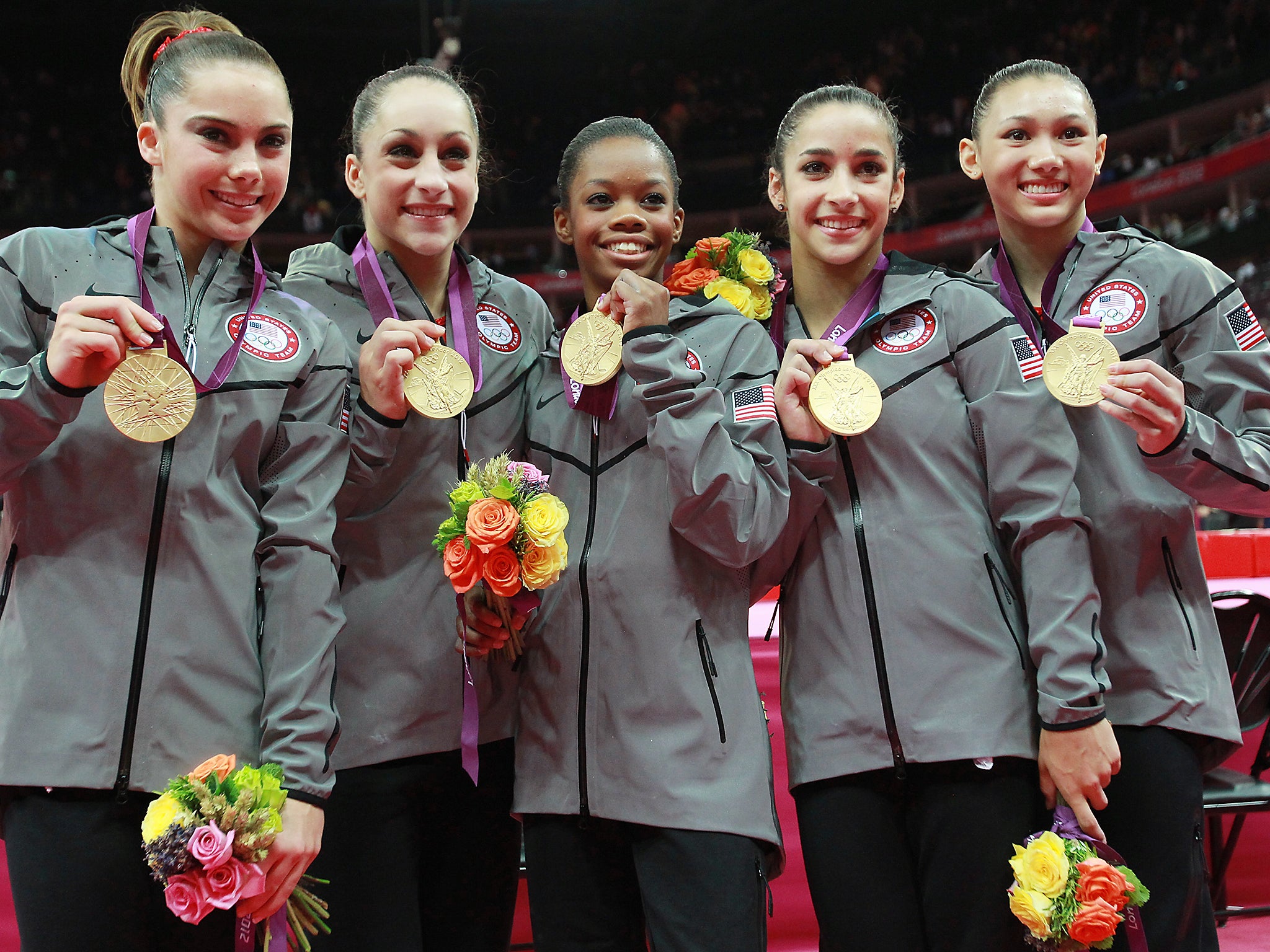 McKayla Maroney, Jordyn Wieber, Gabrielle Douglas, Alexandra Raisman and Kyla Ross of the United States celebrate after winning the gold medal in the Artistic Gymnastics Women's Team final on Day 4 of the London 2012 Olympic Games