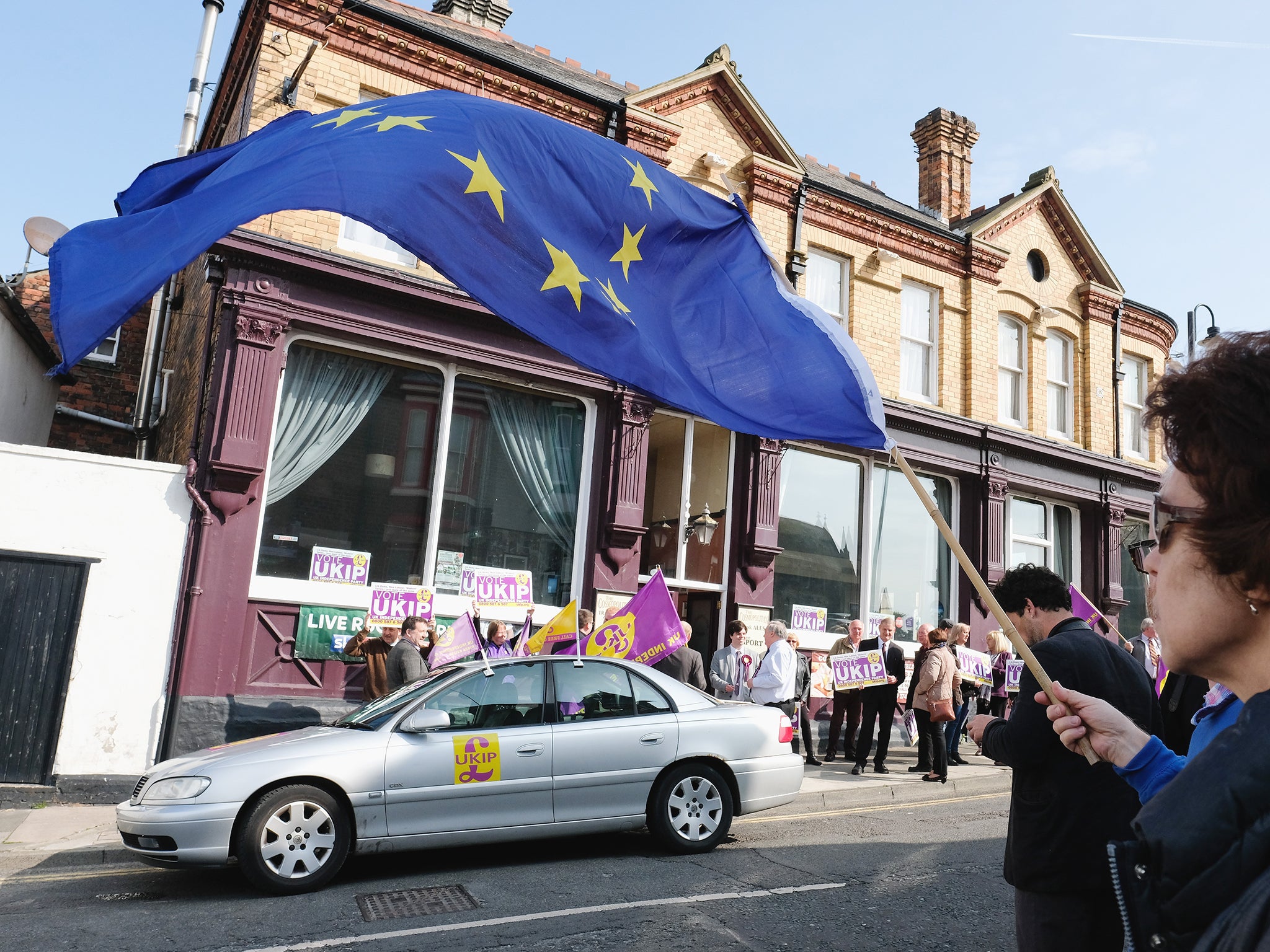 Pro-EU supporters gather outside a pub in Hartlepool ahead of a visit by UKIP leader Paul Nuttall