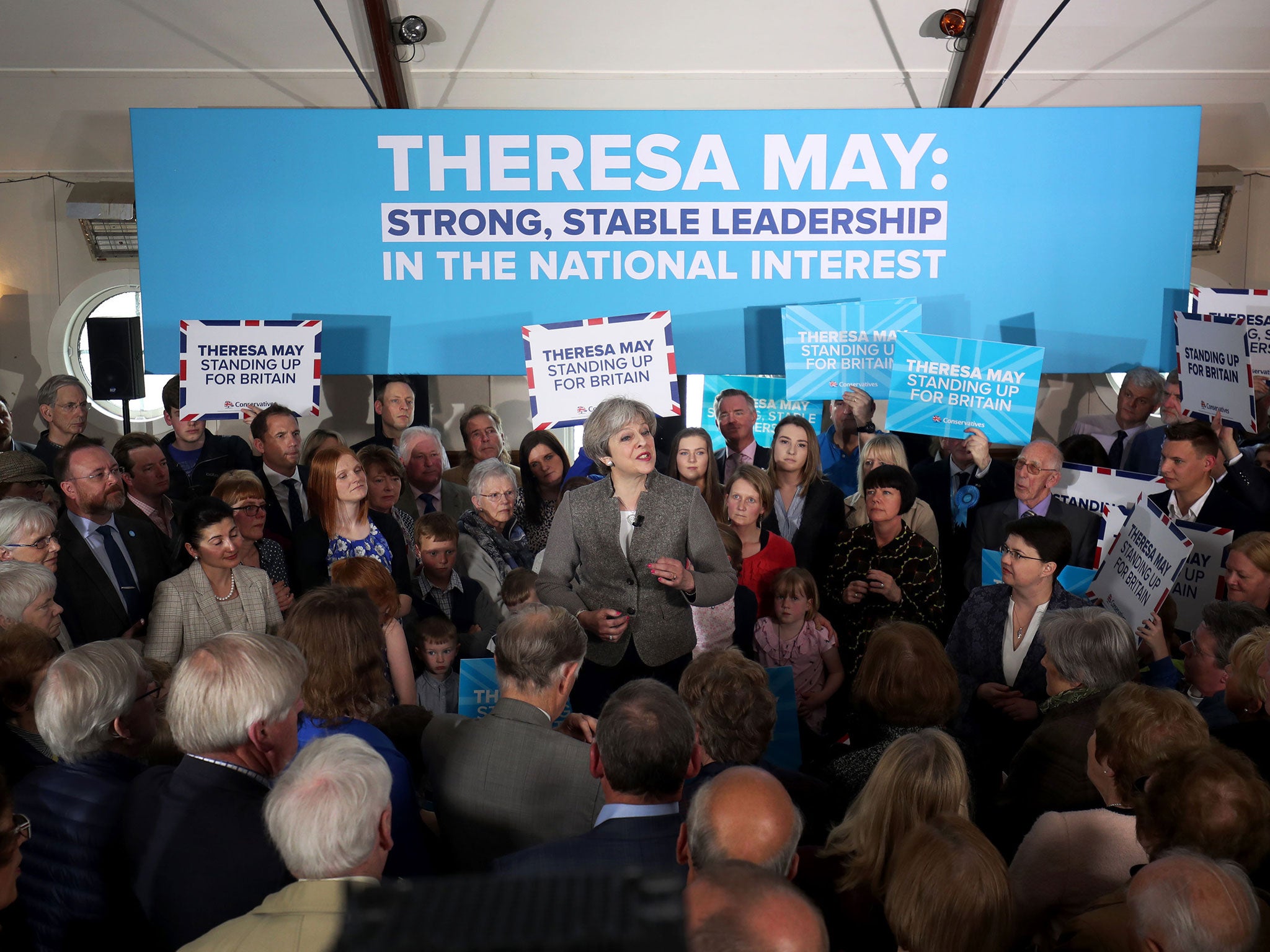 Prime Minister Theresa May delivers a speech while on the election campaign trail in the village of Crathes, Aberdeenshire.