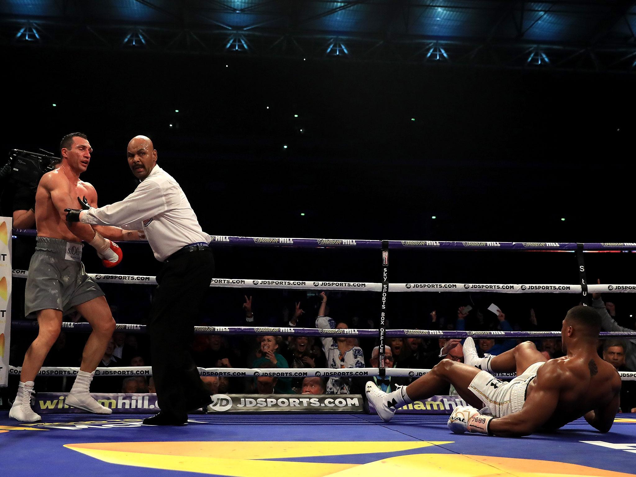 Joshua came back from being knocked down in the sixth to win