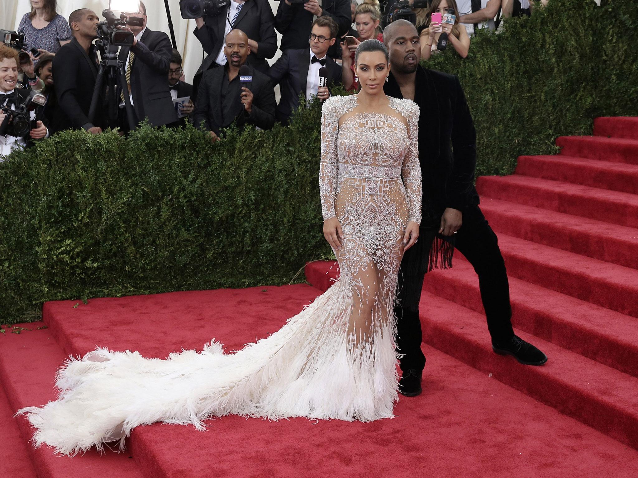 Kim Kardashian West in Roberto Cavalli and Kanye West at the gala in 2015 (Getty Images )