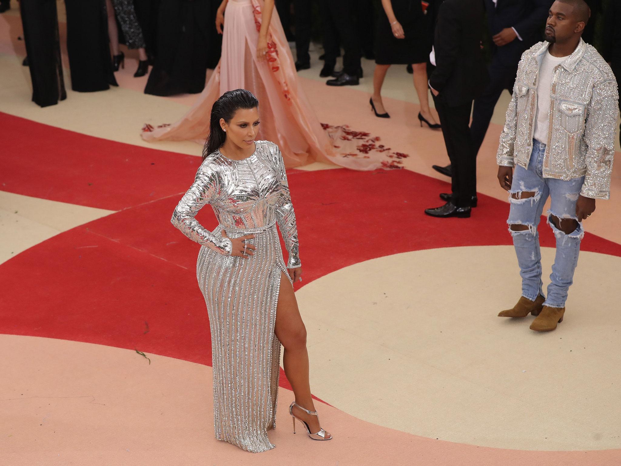 Kim Kardashian West and Kanye West wearing Balmain at the 2016 Met Gala (Getty Images )