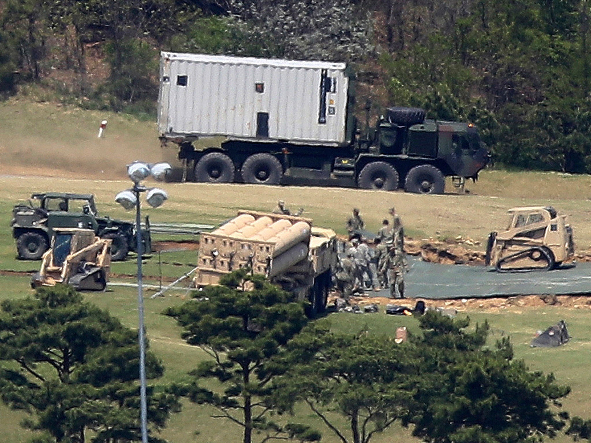 US Army soldiers installing the THAAD system at a golf course in Seongju in April