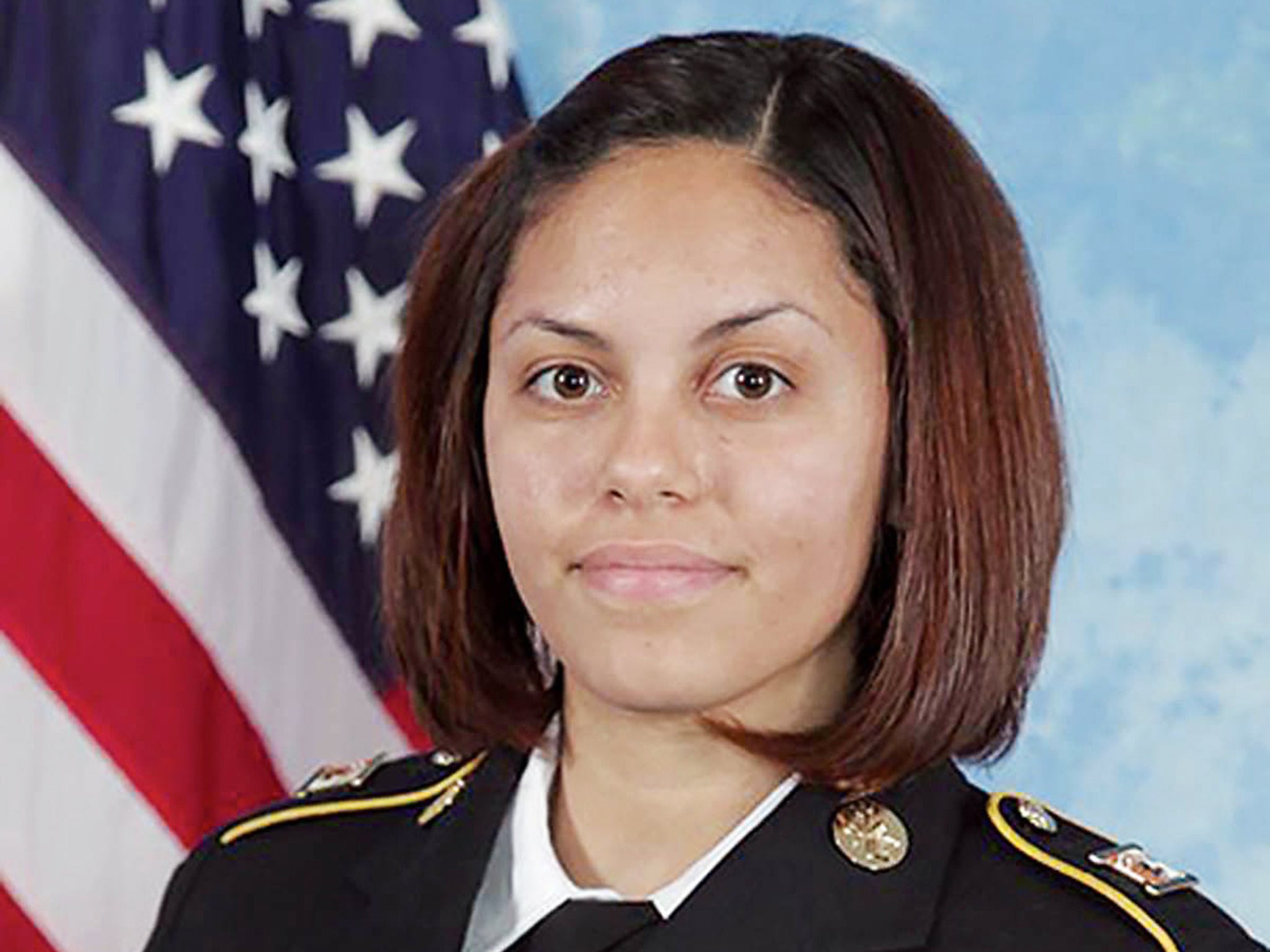 US Army combat photographer Spc. Hilda I. Clayton