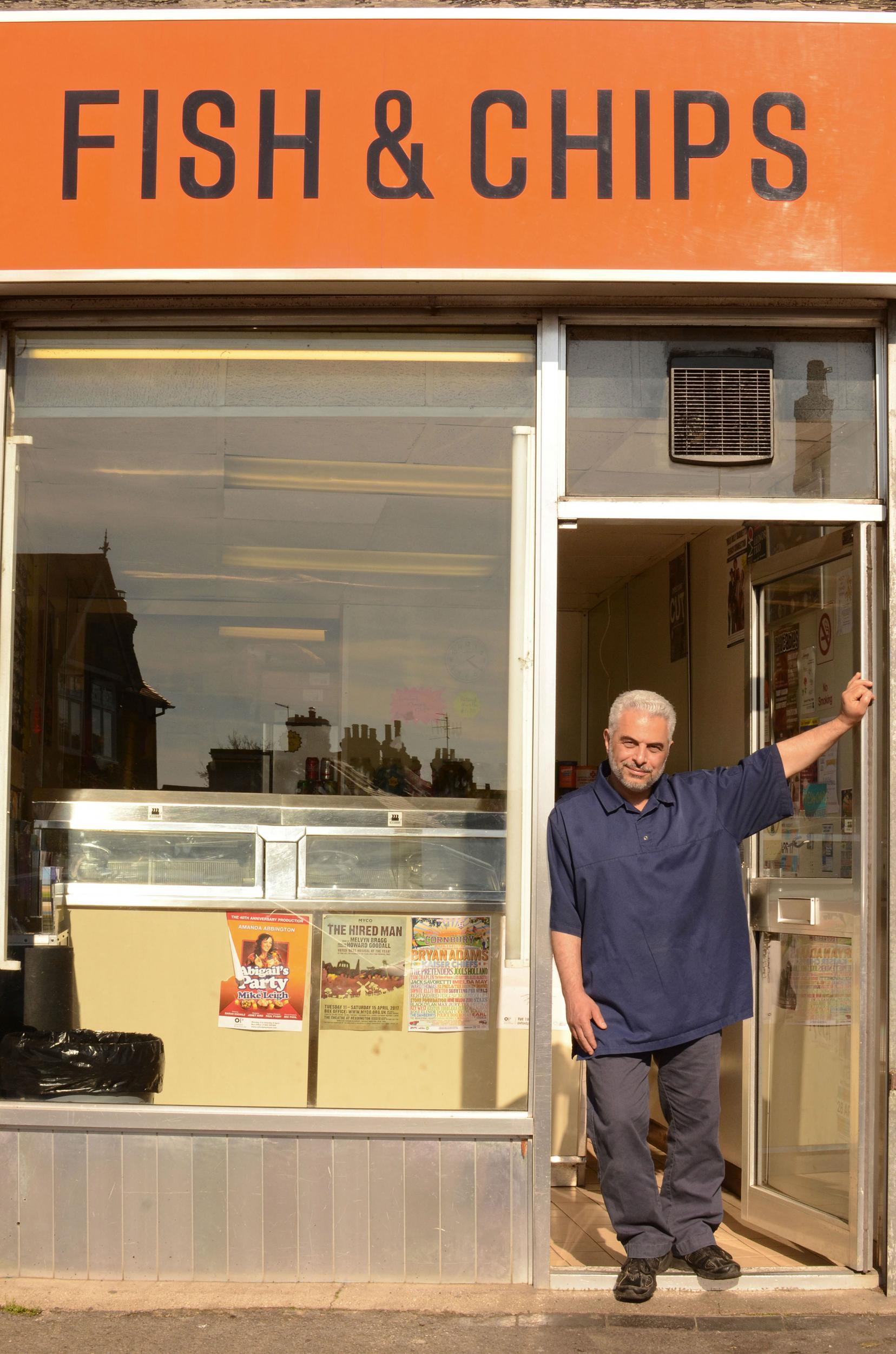 Kazem Hakimi outside his Oxford fish and chip shop (© Ellie Nixon and Modern Art Oxford)