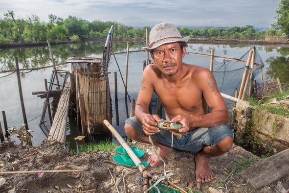 A local fish farmer whose livelihood is put in jeopardy by flooding