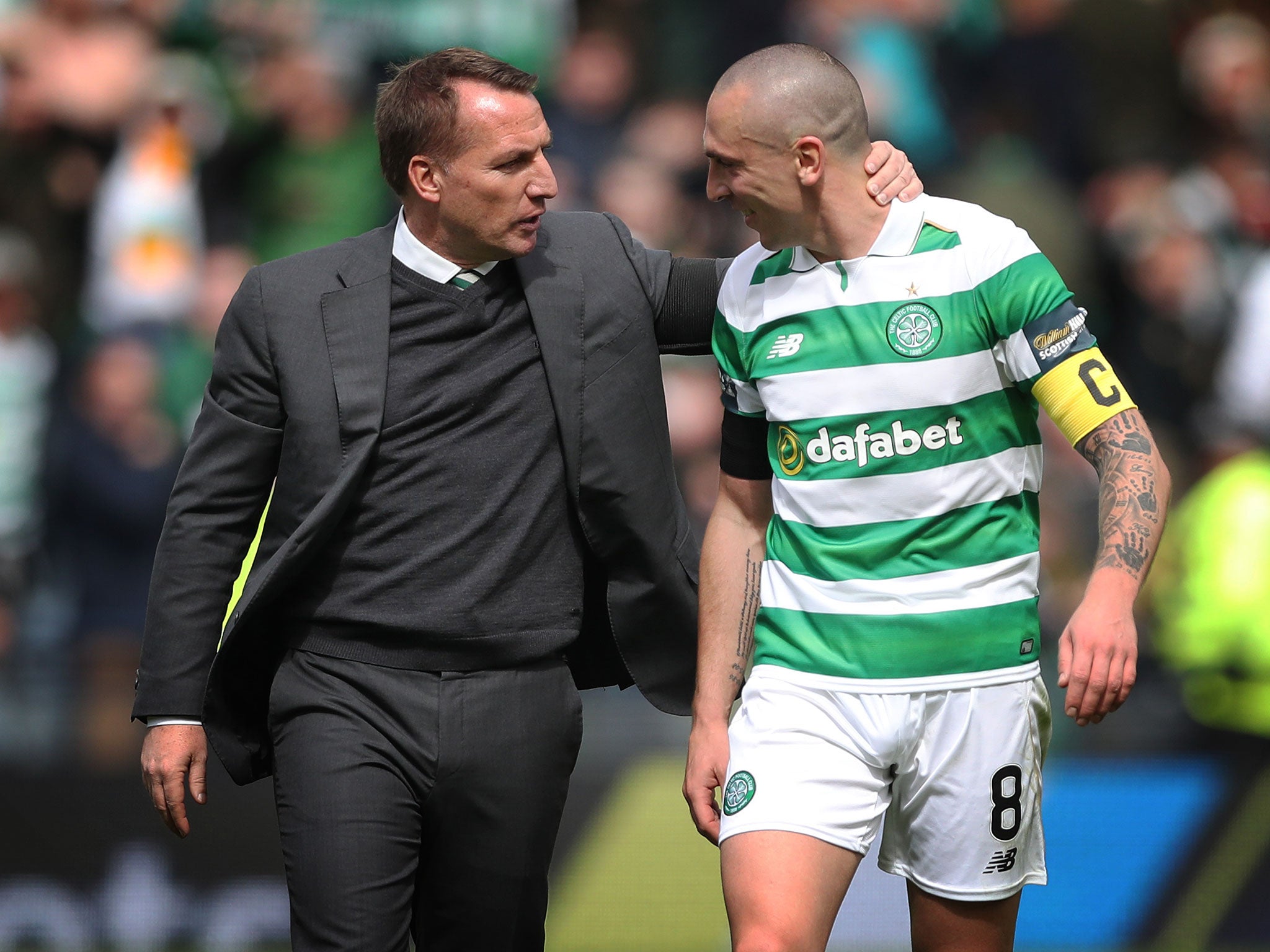 Brendan Rodgers with his captain Scott Brown after the recent Old Firm victory