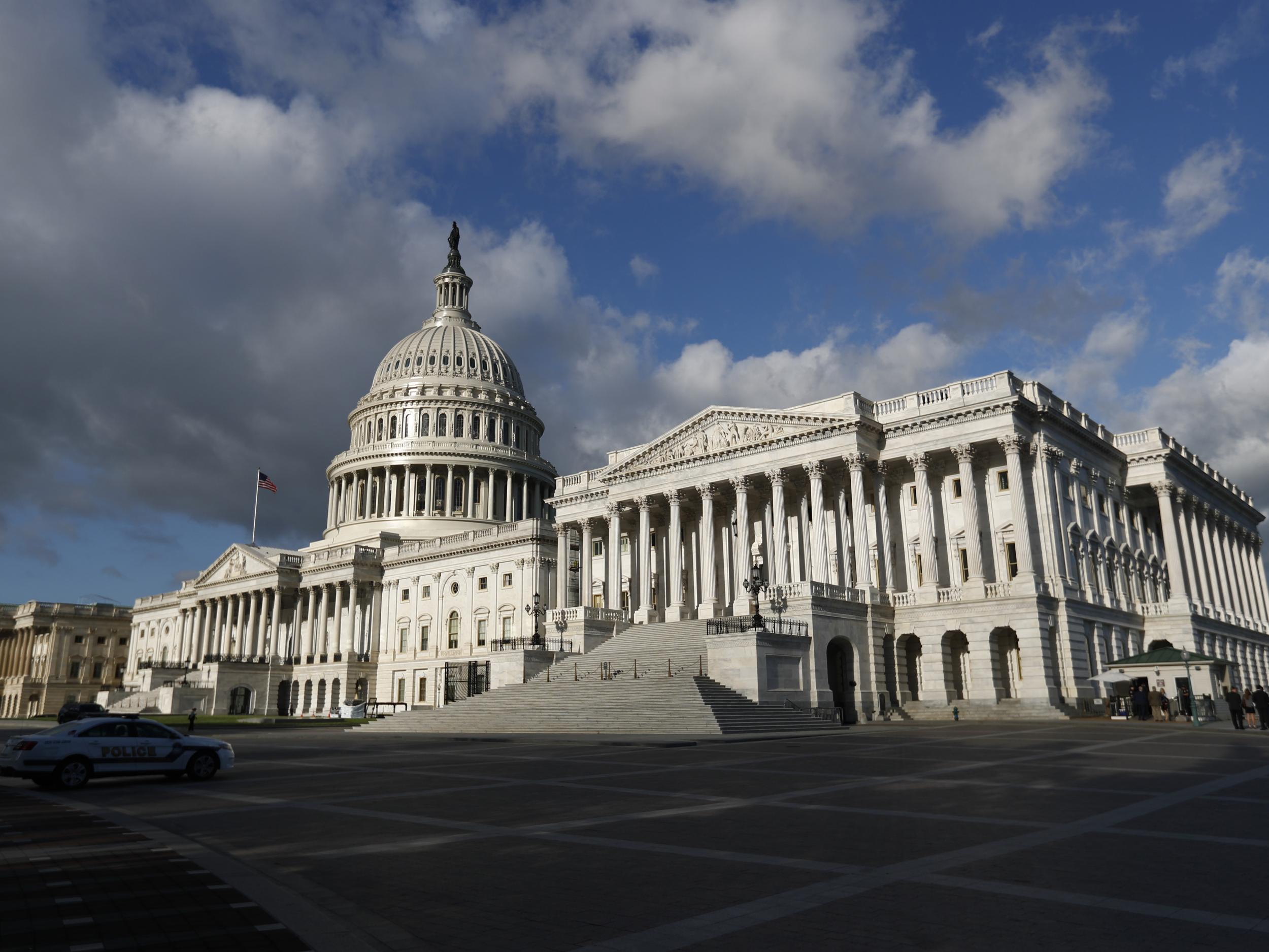 Erasing the threat of a disruptive government shutdown, the White House and top lawmakers endorsed a $1.1 trillion spending bill to carry the nation through to September, an agreement underscoring that Democrats retain considerable clout in Donald Trump's turbulent presidency