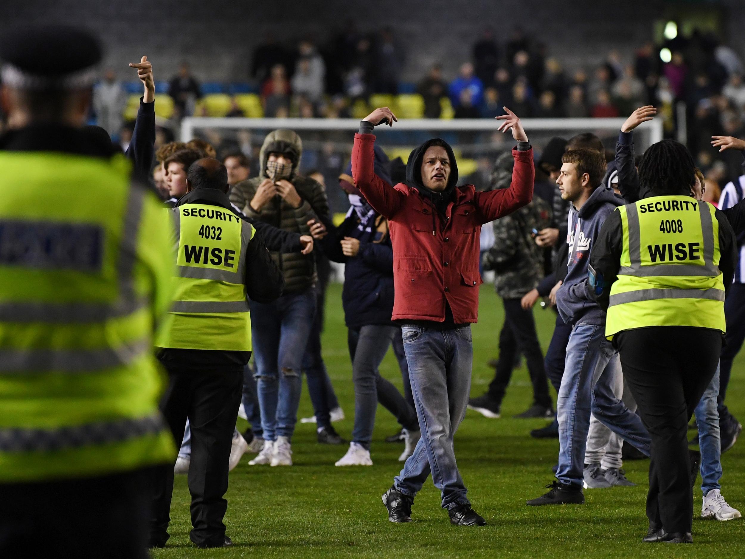 Fans invaded the pitch at full-time