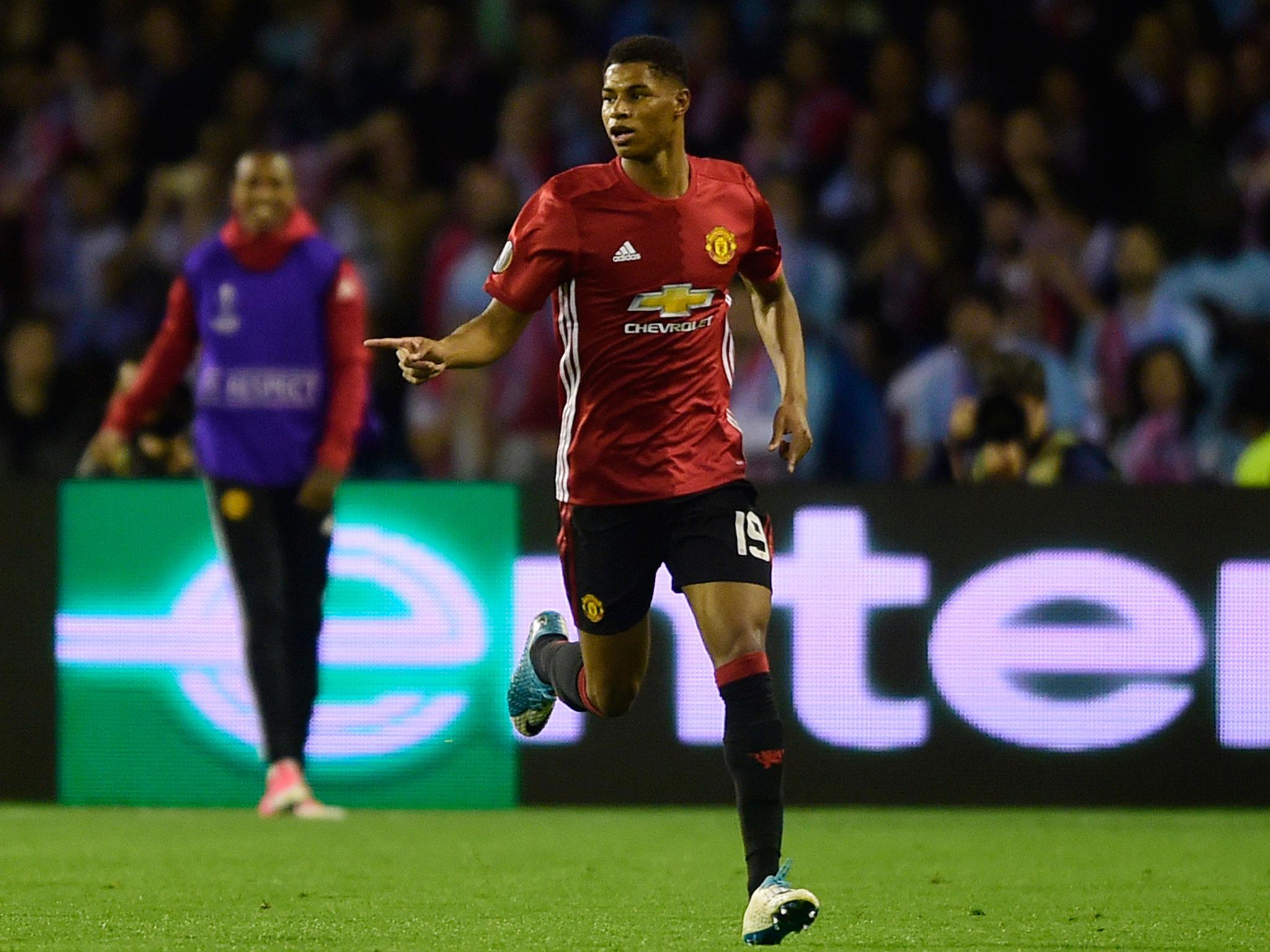 Marcus Rashford celebrates after his free-kick for Manchester United, just seconds after predicting he'd score