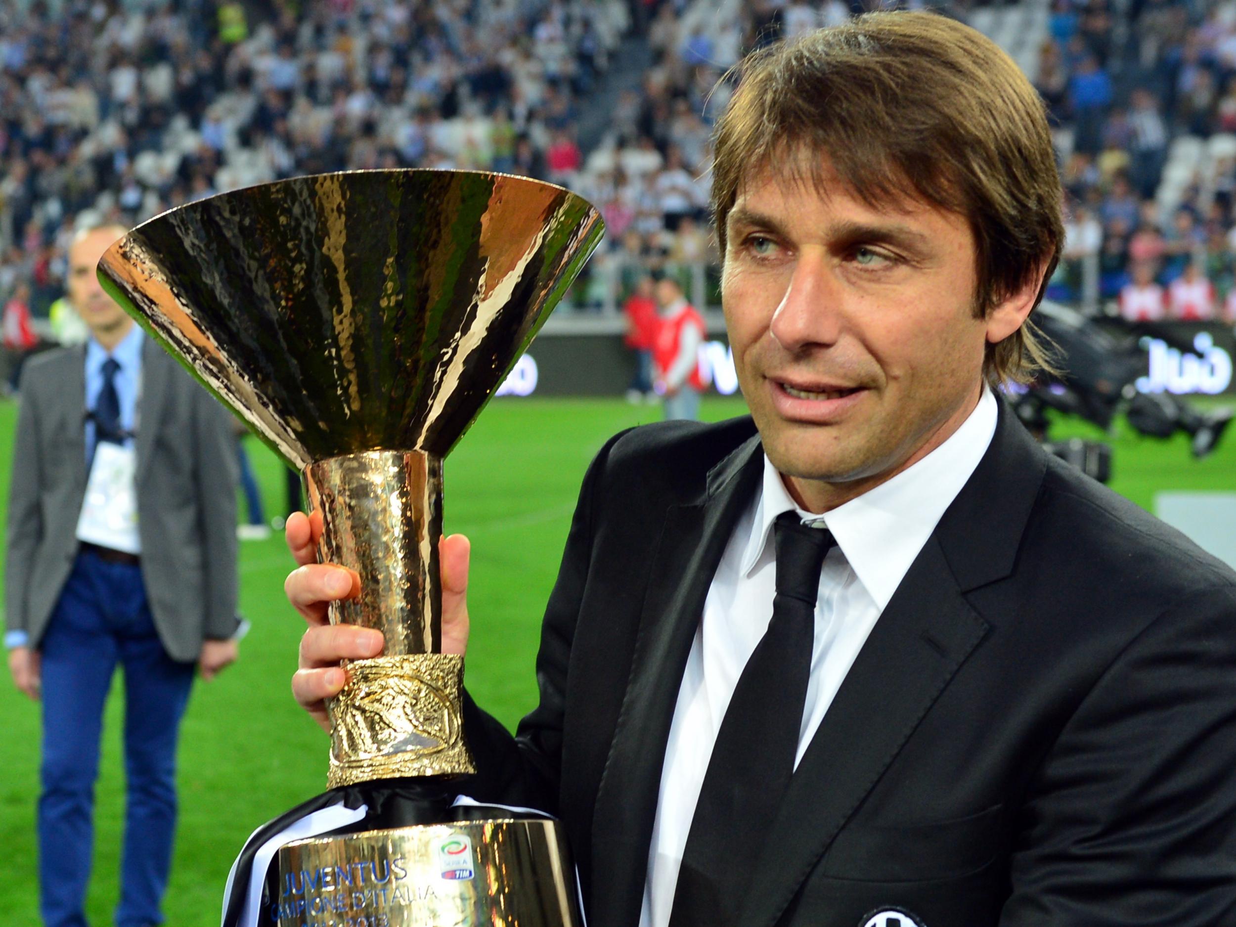 Conte after winning the Coppa Campioni d'Italia with Juventus in 2013 (Getty )